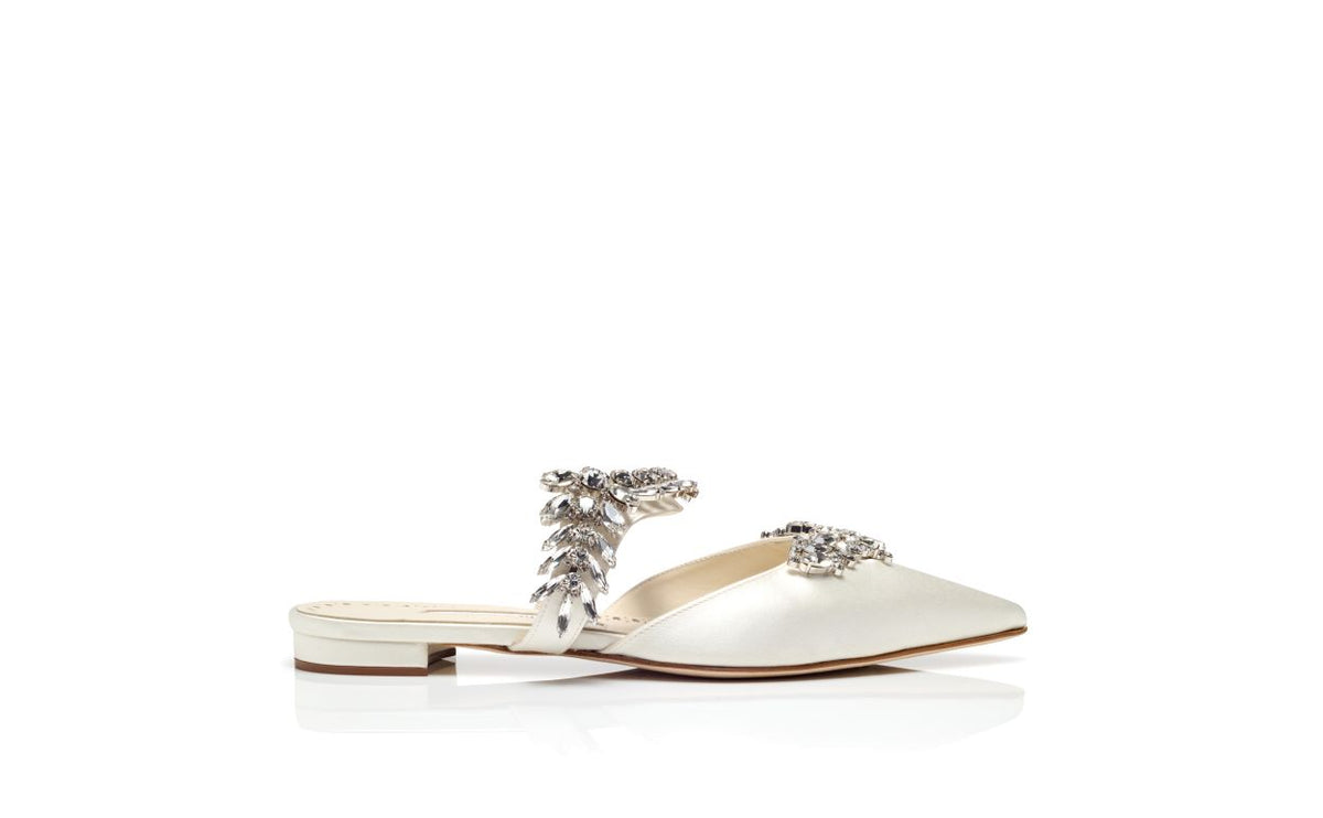 Valentina Lace White Crystal Embellished Mules – side profile showing white crystal embellished, pointed toe, satin…