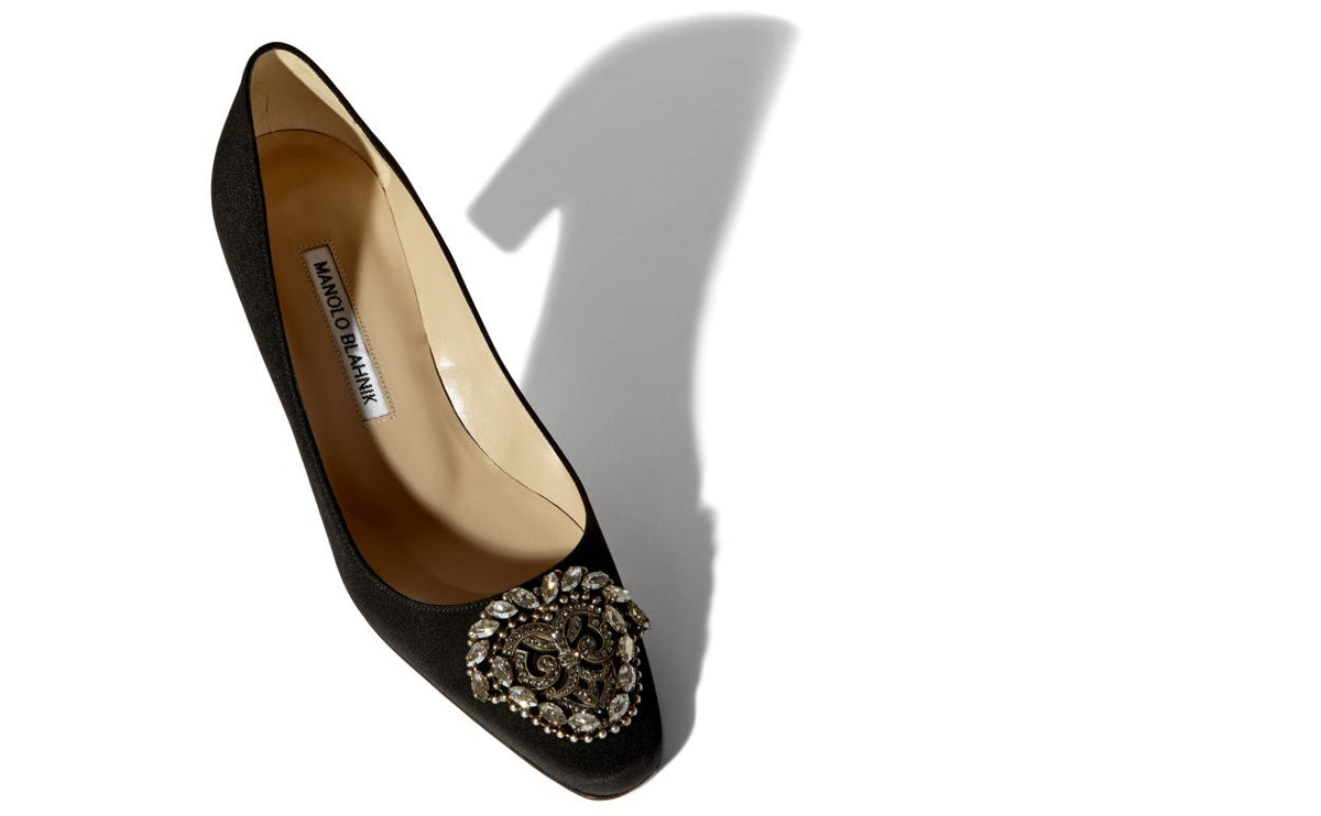 Adriana Dawn Black Jewel Buckle Pumps – front three-quarter view showing black jewel buckle, crystal buckle, almond toe…