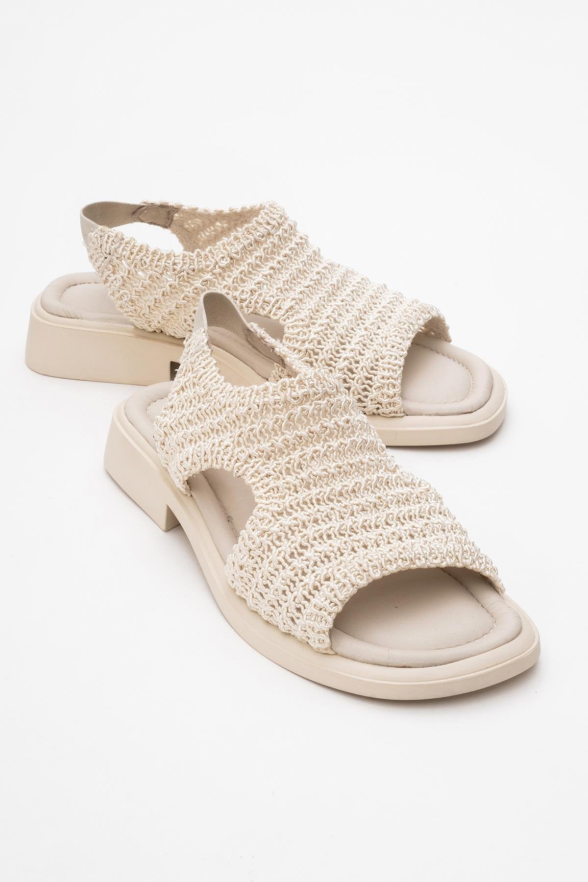 Weave - Beige Leather Woven Sandal – front three-quarter view showing leather, Vowalisse