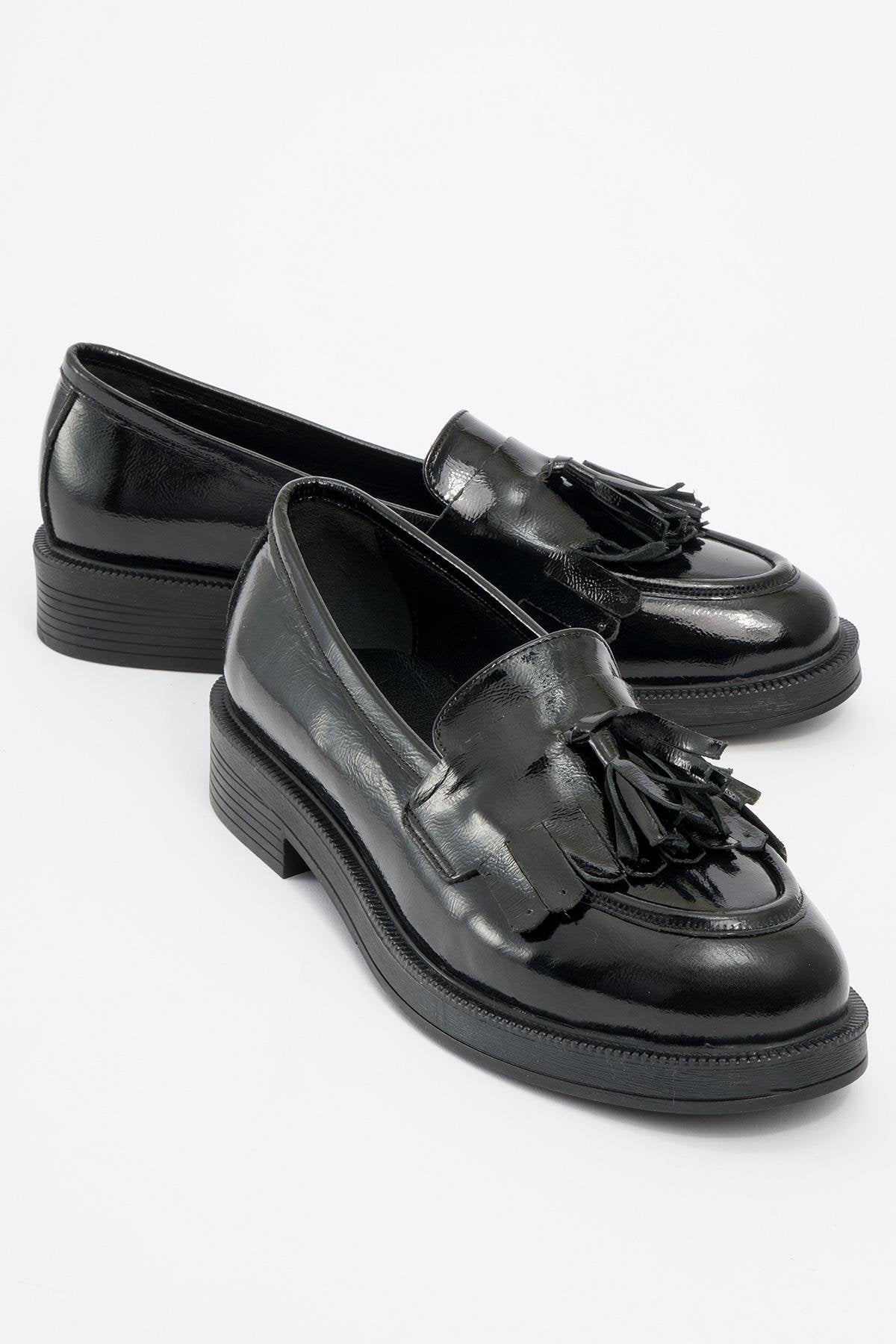 Milly - Black Patent Leather Tassel Loafers – front three-quarter view showing leather, suede, black, Vowalisse