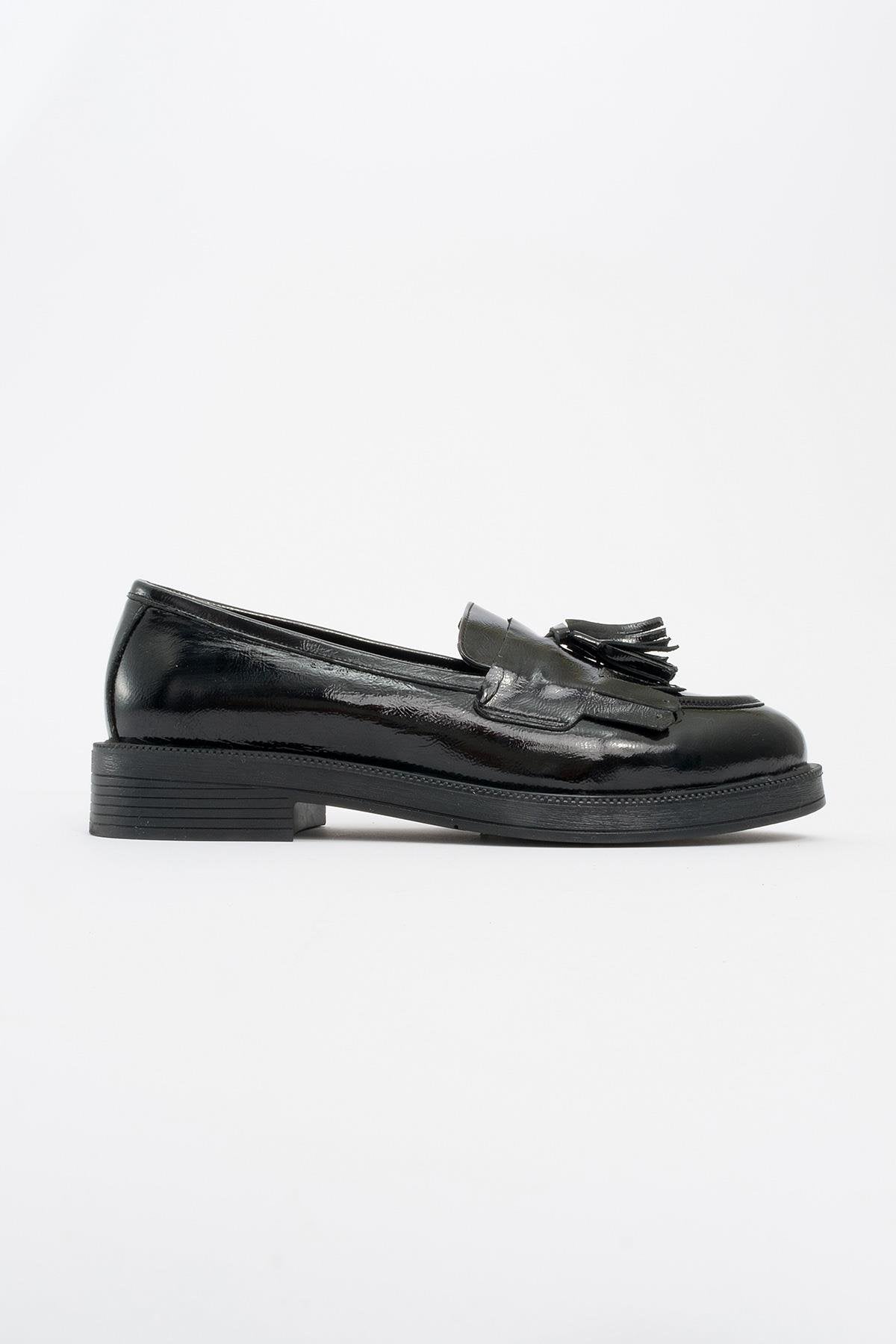 Milly - Black Patent Leather Tassel Loafers – detail view showing leather, suede, black, Vowalisse