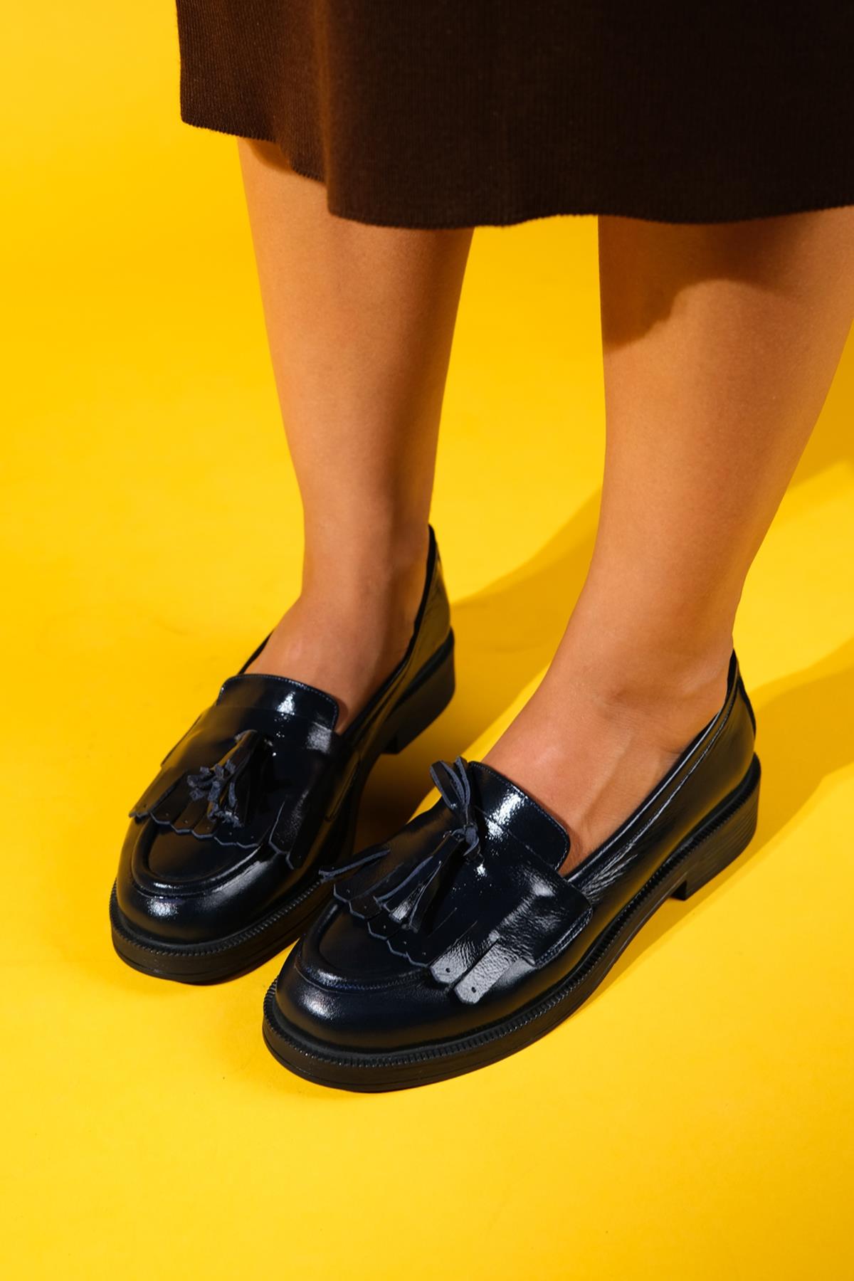 Milly - Navy Patent Leather Tassel Loafers – back view showing leather, suede, red, Vowalisse