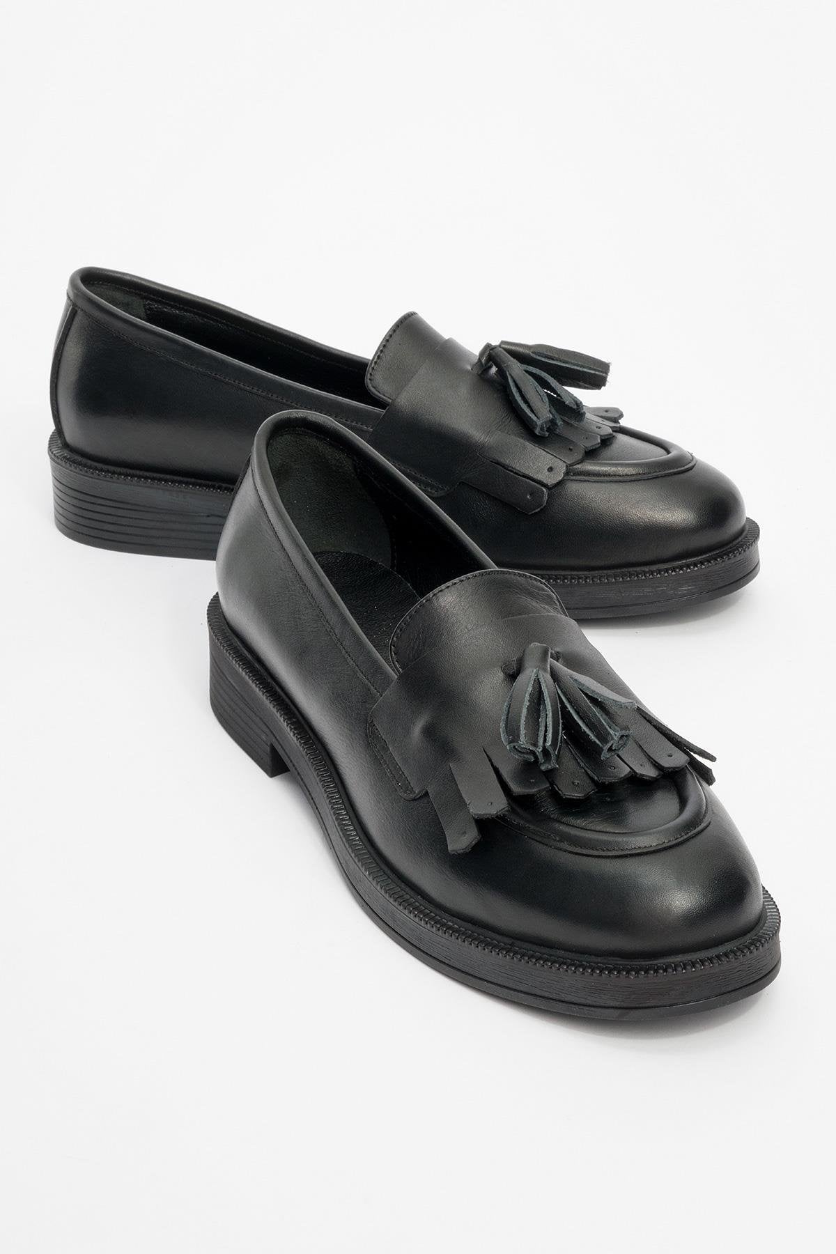 Milly - Black Leather Tassel Loafers – front three-quarter view showing leather, suede, black, Vowalisse