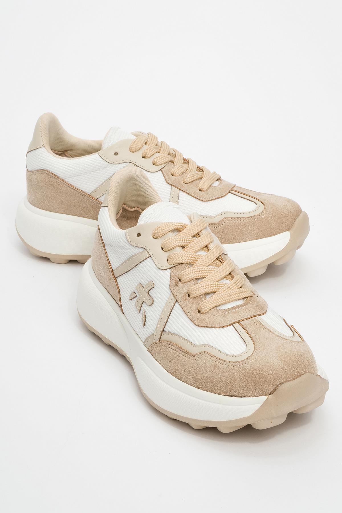 Nolton - Beige-White Sneaker – front three-quarter view showing leather, white, Vowalisse