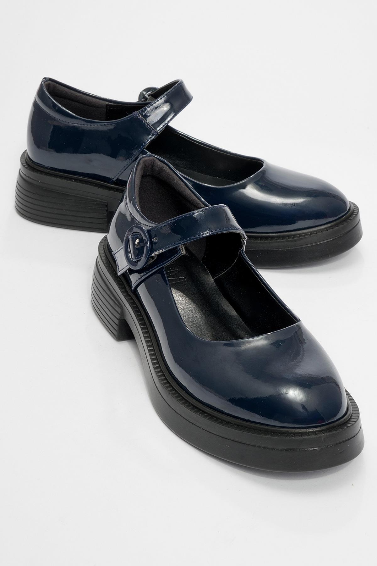 Petric - Navy Patent Loafer – front three-quarter view showing leather, Vowalisse