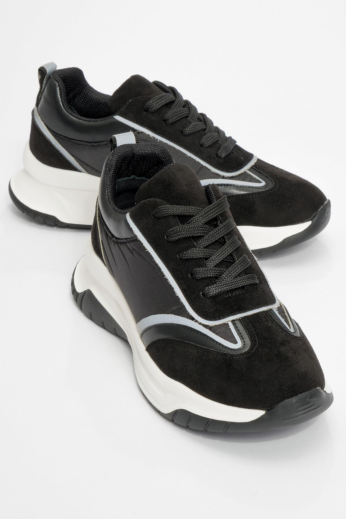 Doch - Black Parachute Sneaker – front three-quarter view showing leather, black, Vowalisse