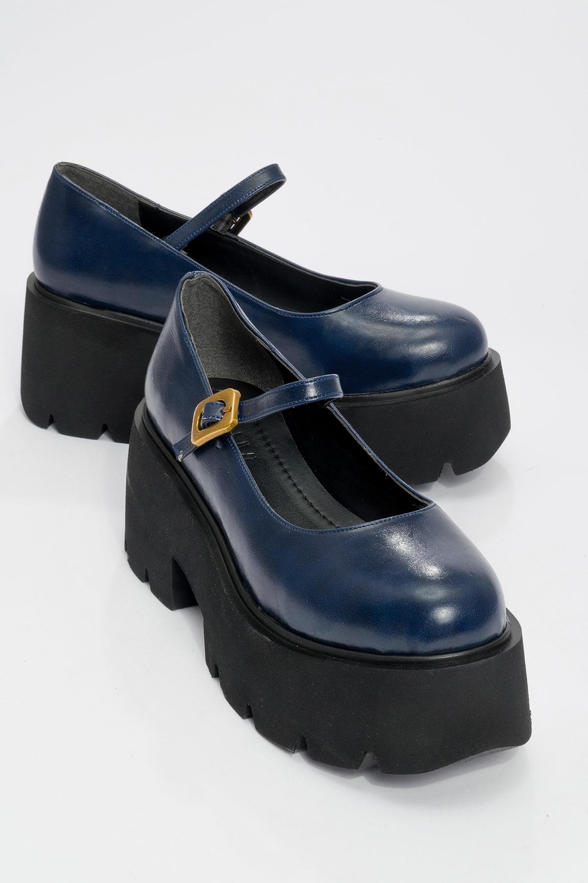 Linley Navy Platform Loafer – front three-quarter view showing leather, gold, Vowalisse