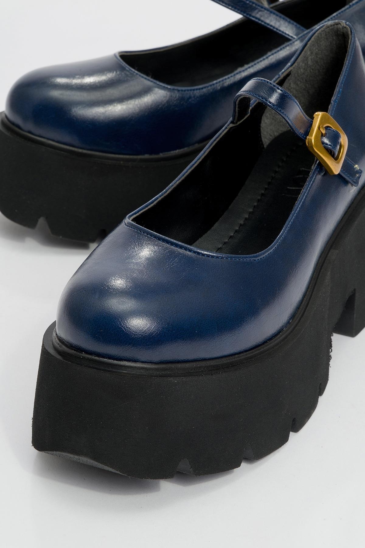 Linley Navy Platform Loafer – detail view showing leather, gold, Vowalisse