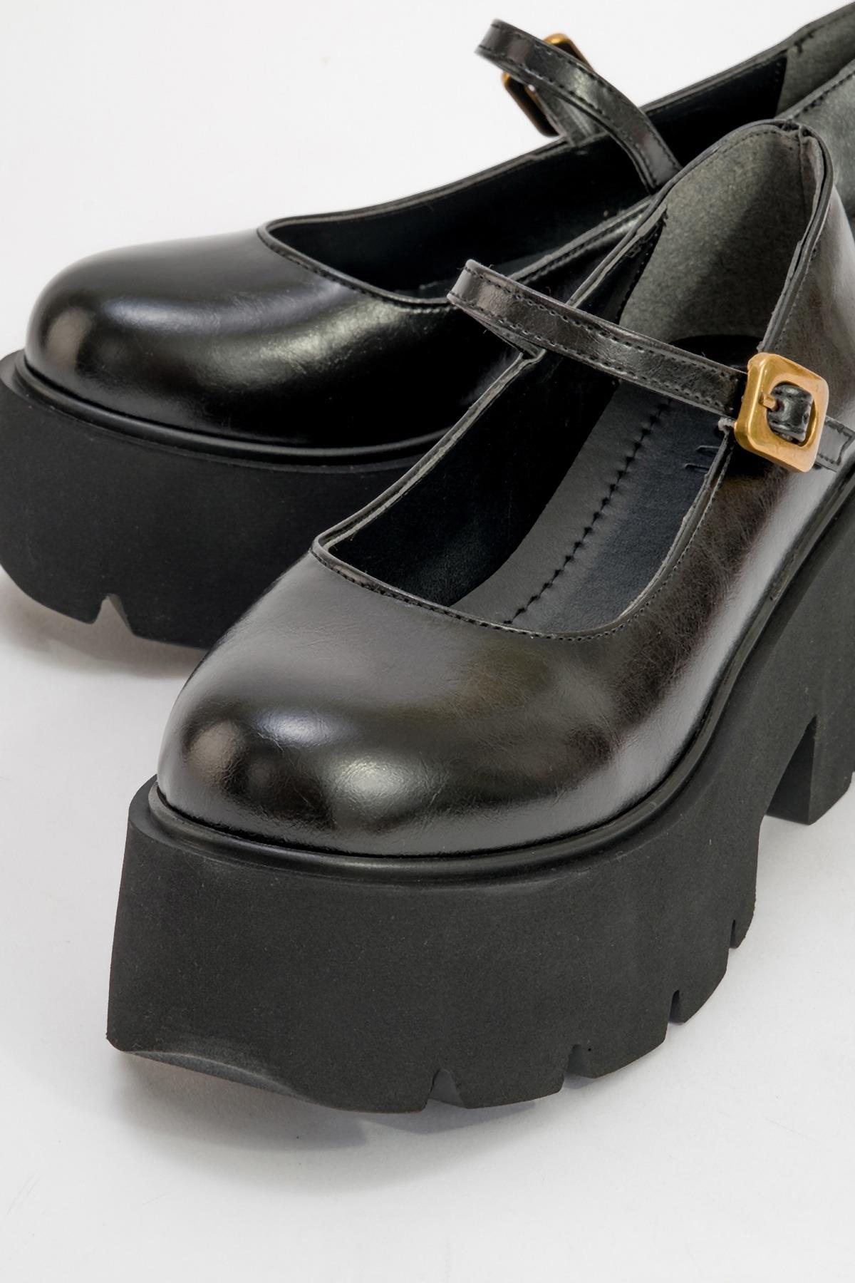 Linley Black Platform Loafer – detail view showing leather, black, gold, Vowalisse