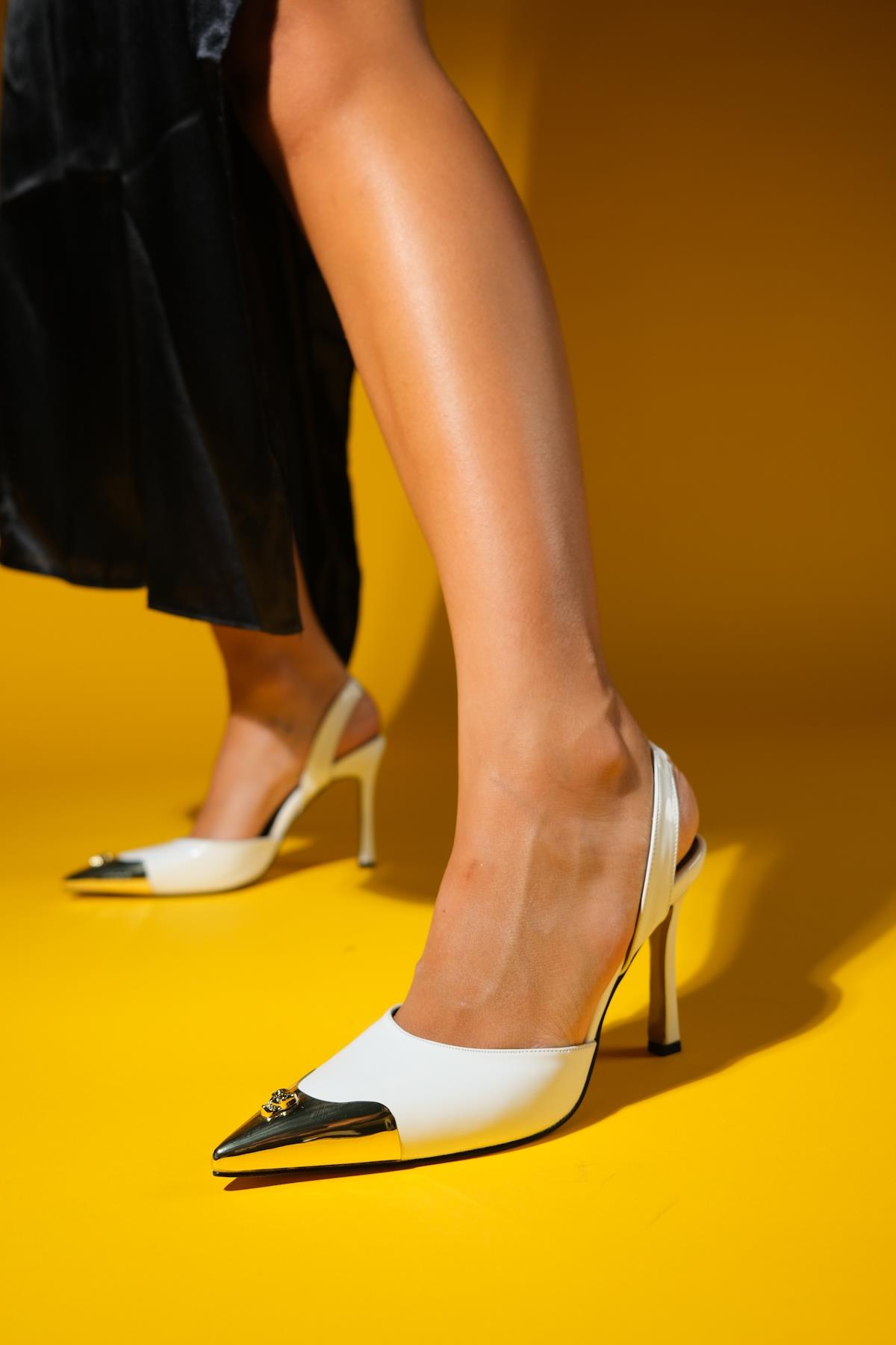 Jubez - White Patent Slim Heel Pump – front three-quarter view showing leather, white, Vowalisse