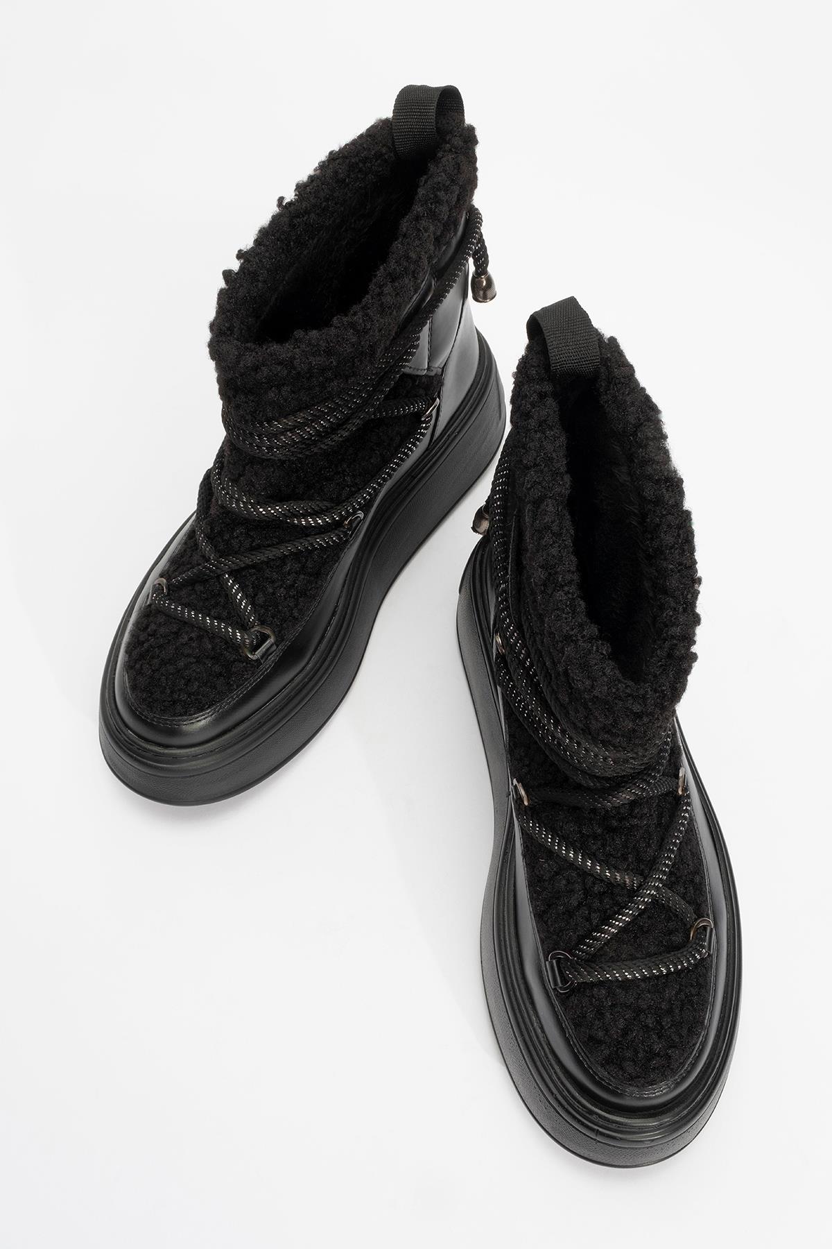 Dila Black Fur-Lined Winter Boot – side view showing leather, black, Vowalisse