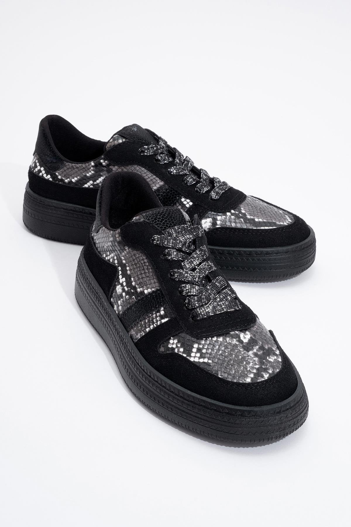 Rexie - Black Patterned Glitter Sneaker – front three-quarter view showing leather, glitter, black, Vowalisse