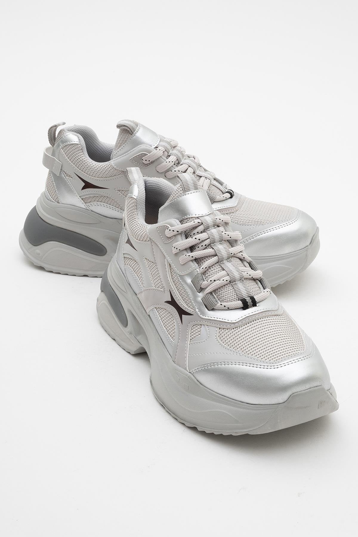 Marron - Silver Gray Sneakers – front three-quarter view showing leather, silver, Vowalisse