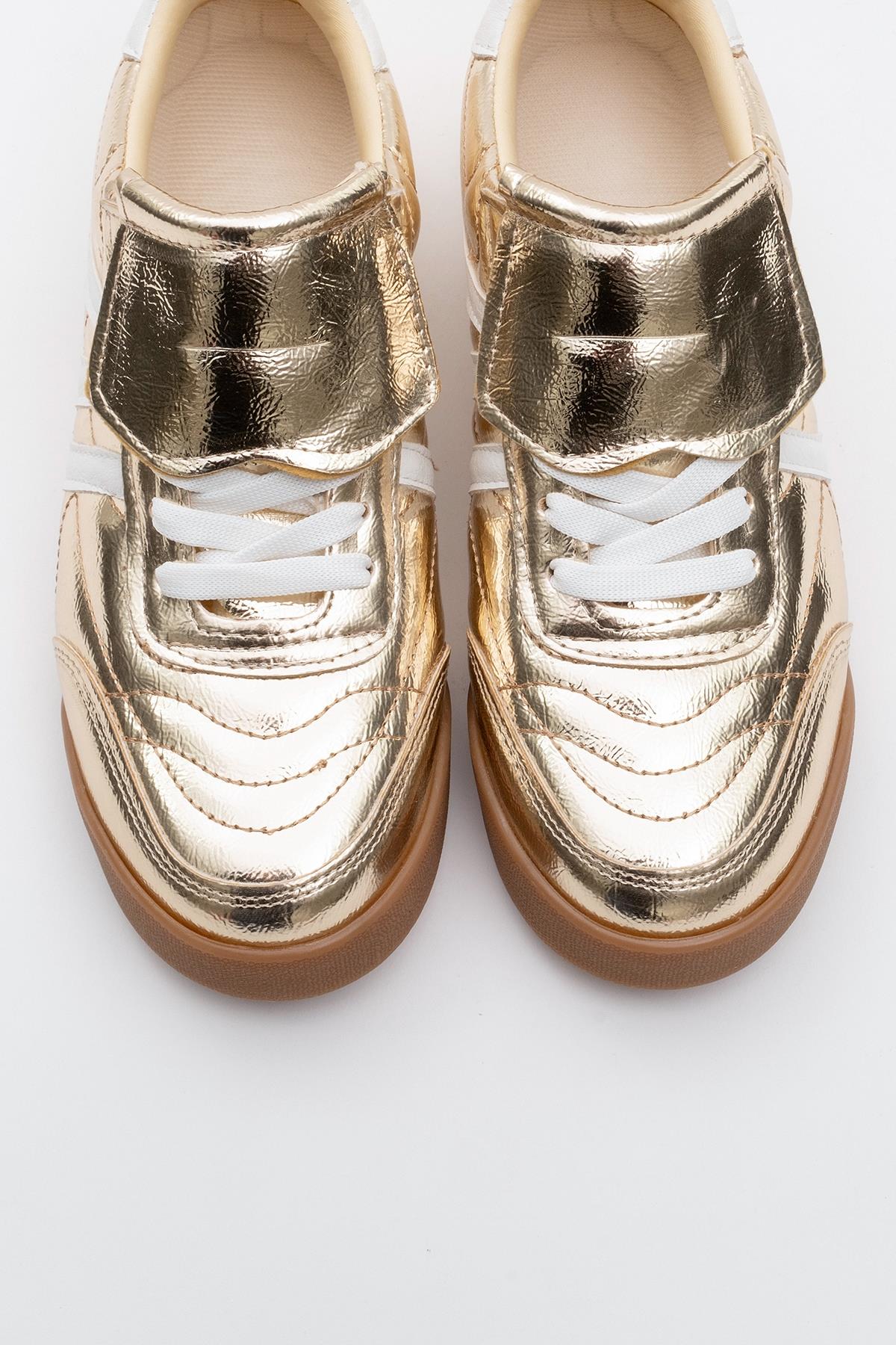 Bria - Gold Sneaker – side view showing leather, gold, red, Vowalisse