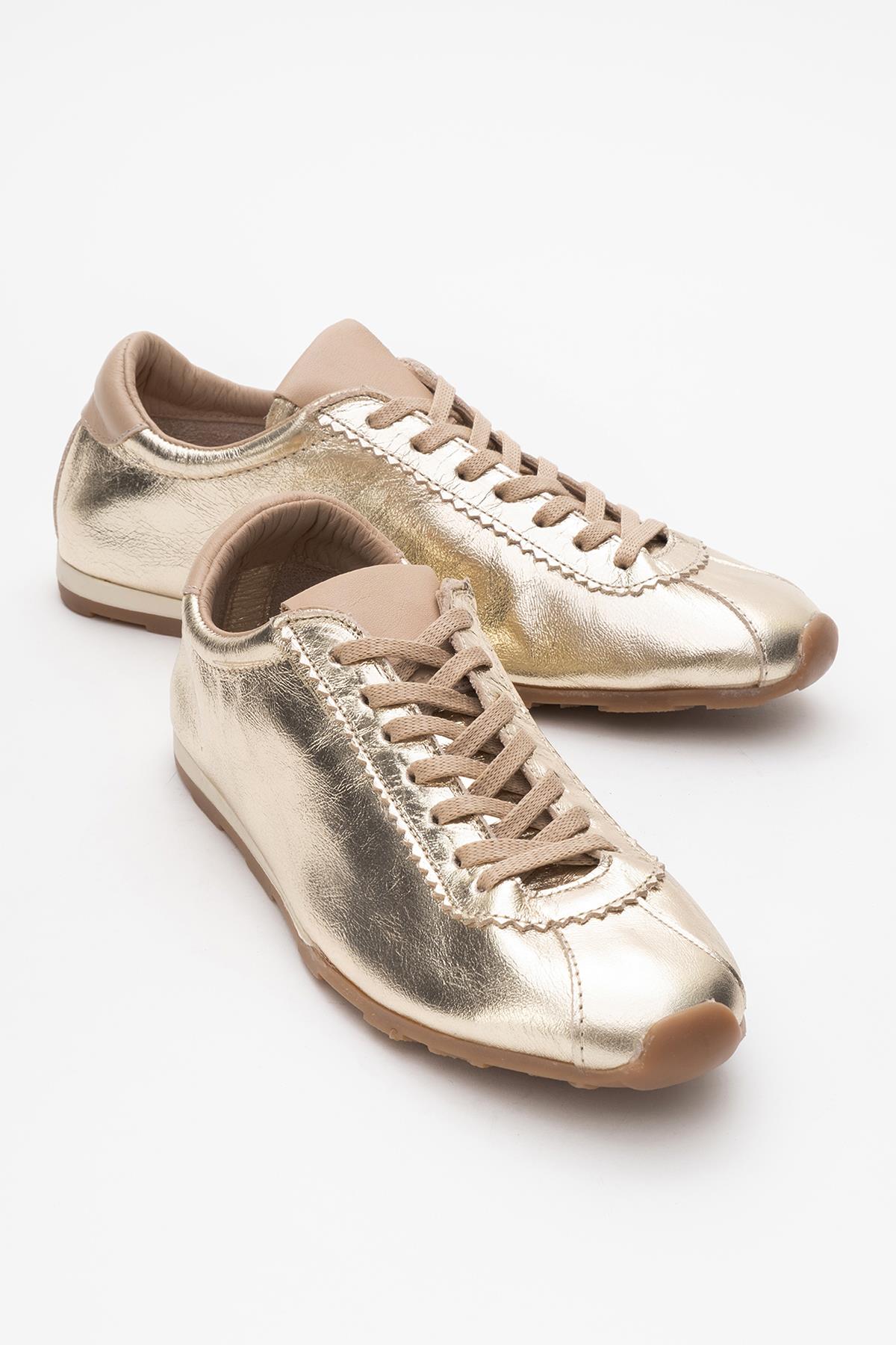 Crea - Gold Leather Sneakers – front three-quarter view showing leather, gold, red, Vowalisse