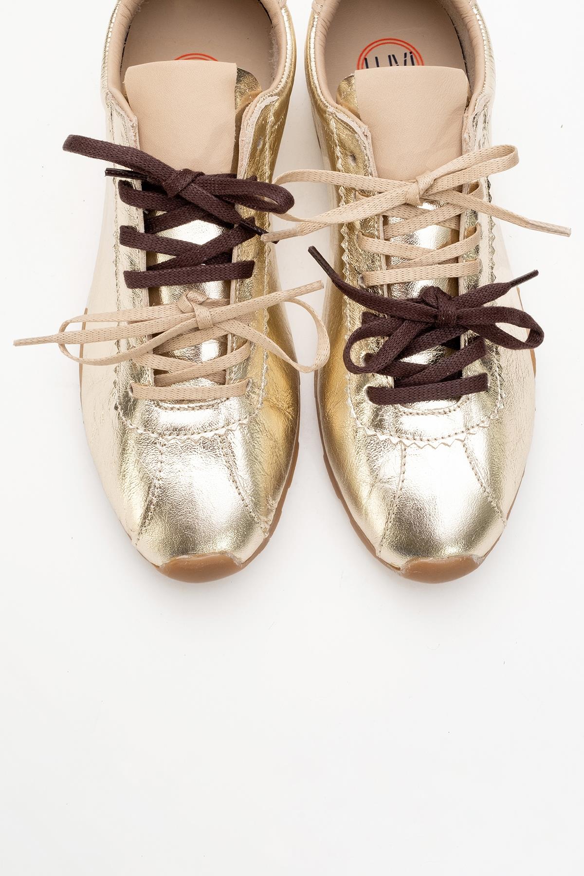 Crea - Gold Leather Sneakers – detail view showing leather, gold, red, Vowalisse