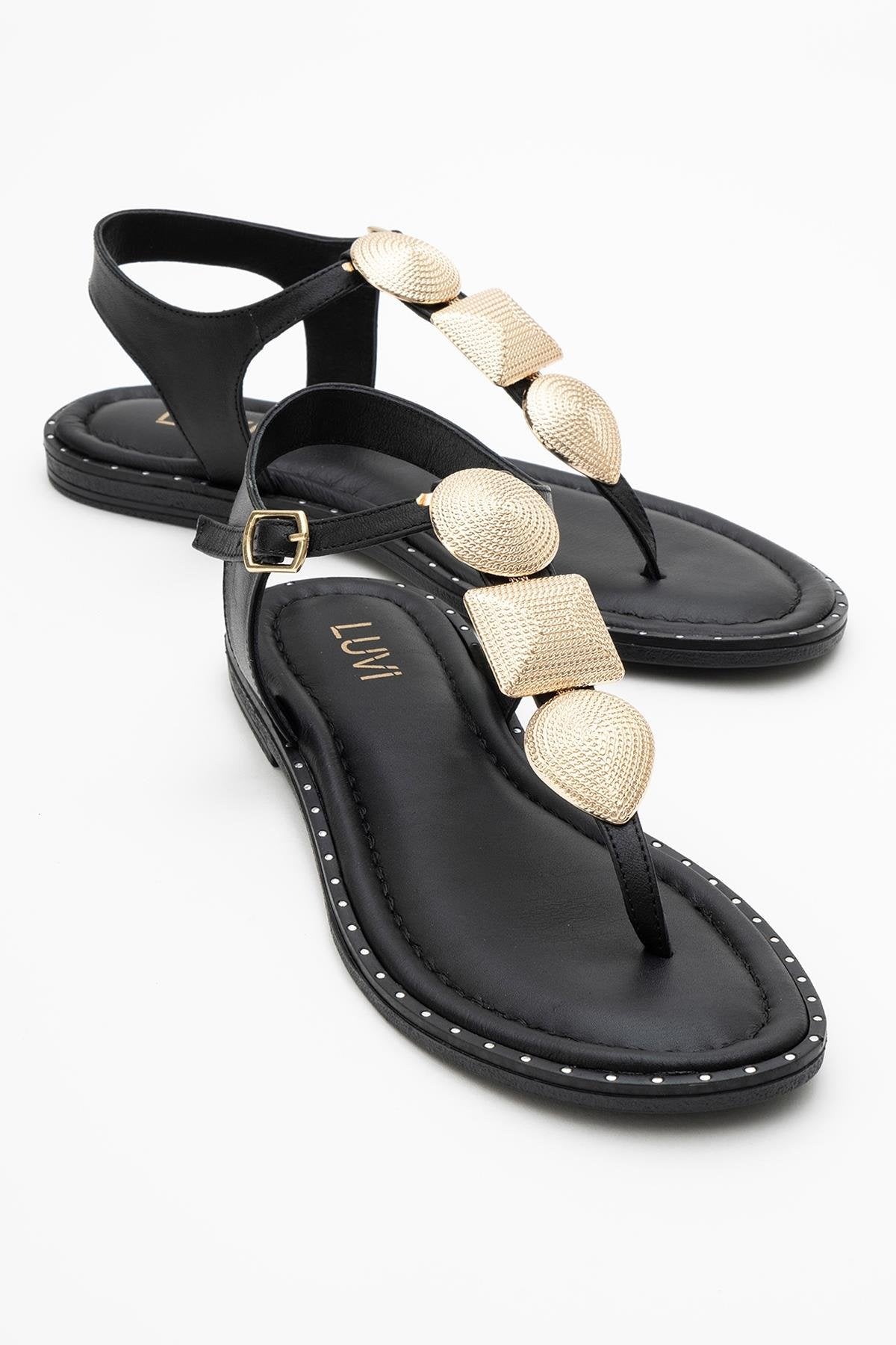 Giulia - Black Leather Flat Sandal – front three-quarter view showing leather, black, gold, Vowalisse