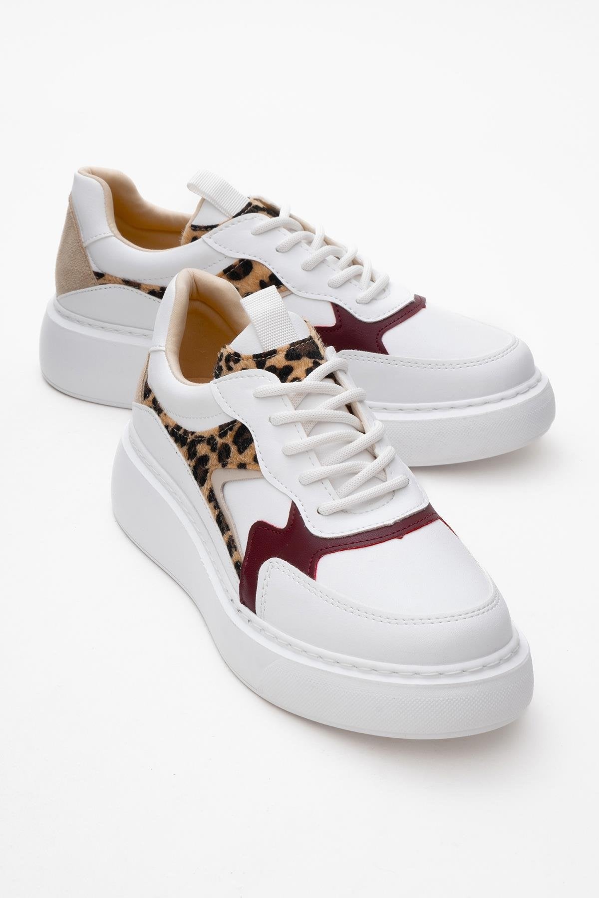 Ida - White Platform Sneakers – front three-quarter view showing leather, white, Vowalisse