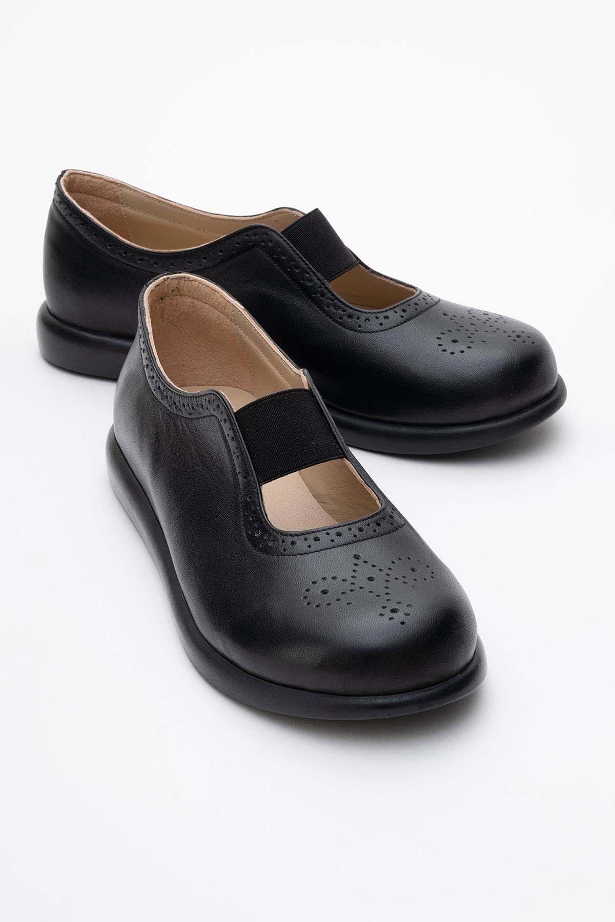 CHELLE Black Elastic Leather Flat – front three-quarter view showing leather, black, Vowalisse