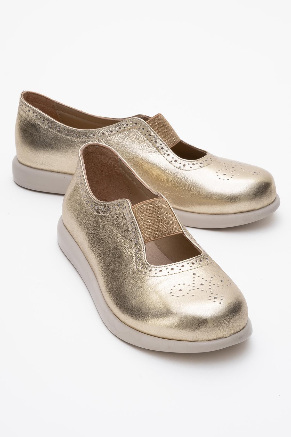 CHELLE Gold Elastic Leather Flat – front three-quarter view showing leather, gold, Vowalisse