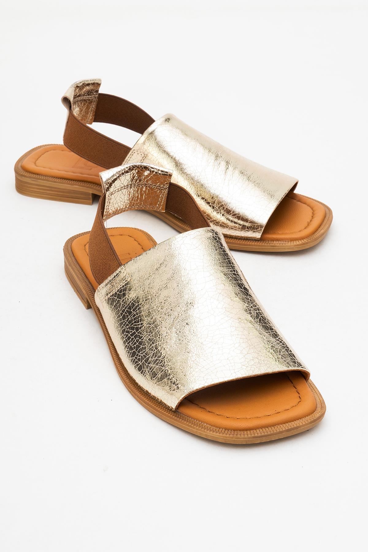 Fuela - Gold Leather Sandals – front three-quarter view showing leather, gold, Vowalisse