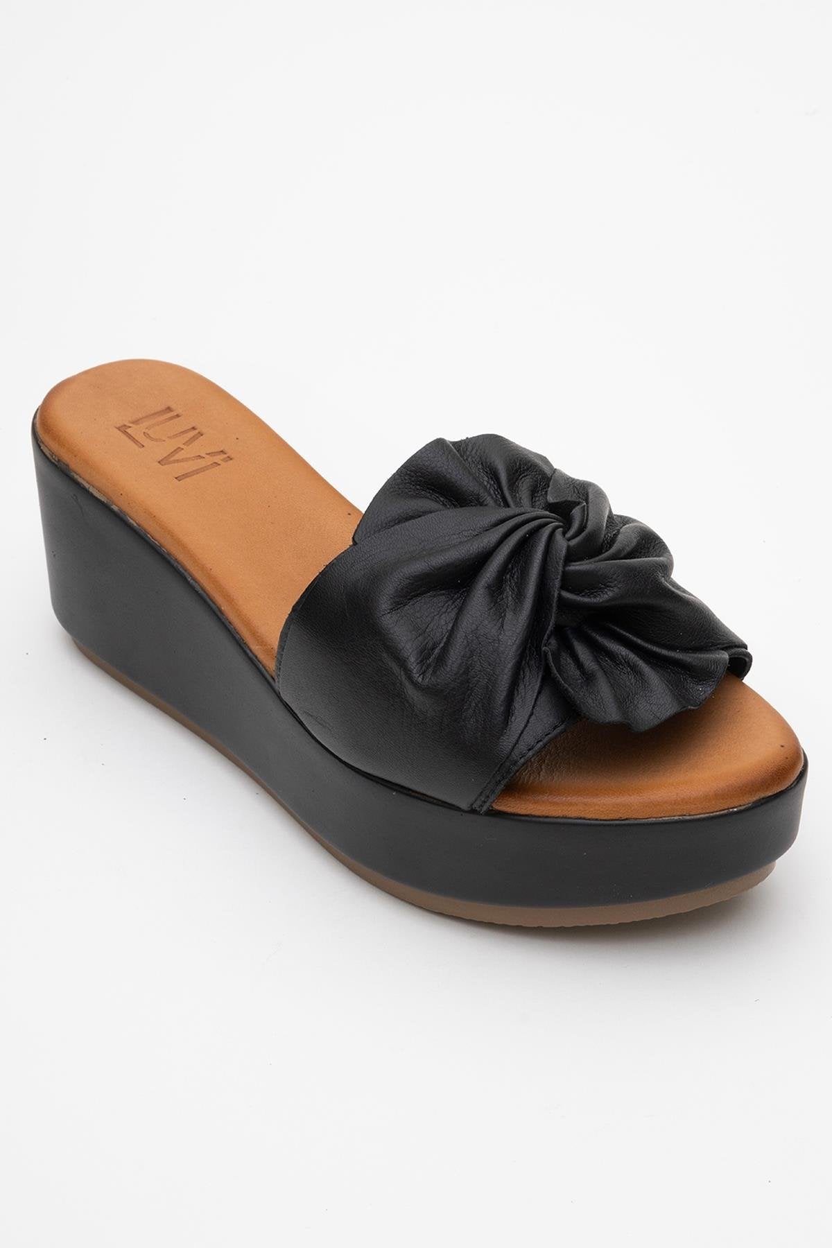 Syndra - Black Bow Wedge Leather Sandal – detail view showing bow, leather, black, Vowalisse