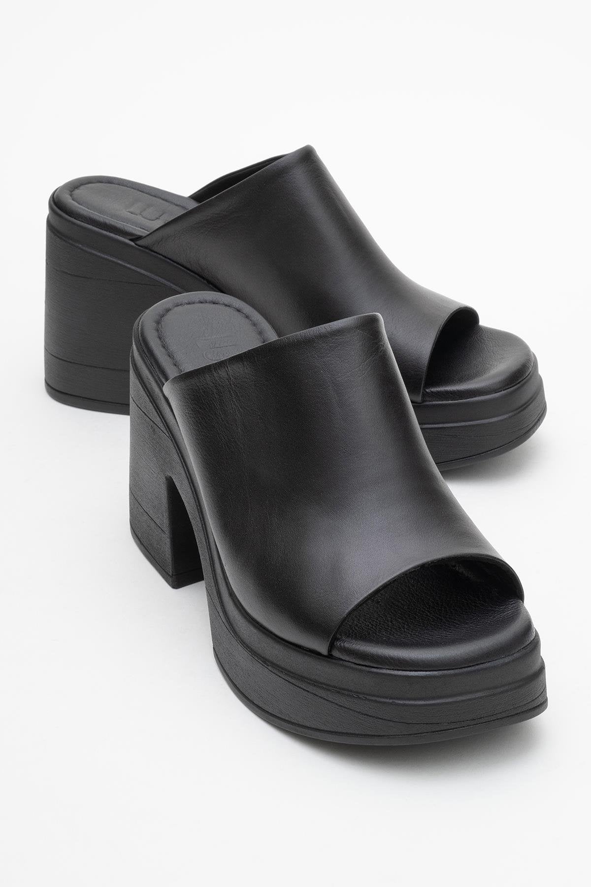Nola - Black Leather Heeled Mules – front three-quarter view showing leather, suede, black, Vowalisse