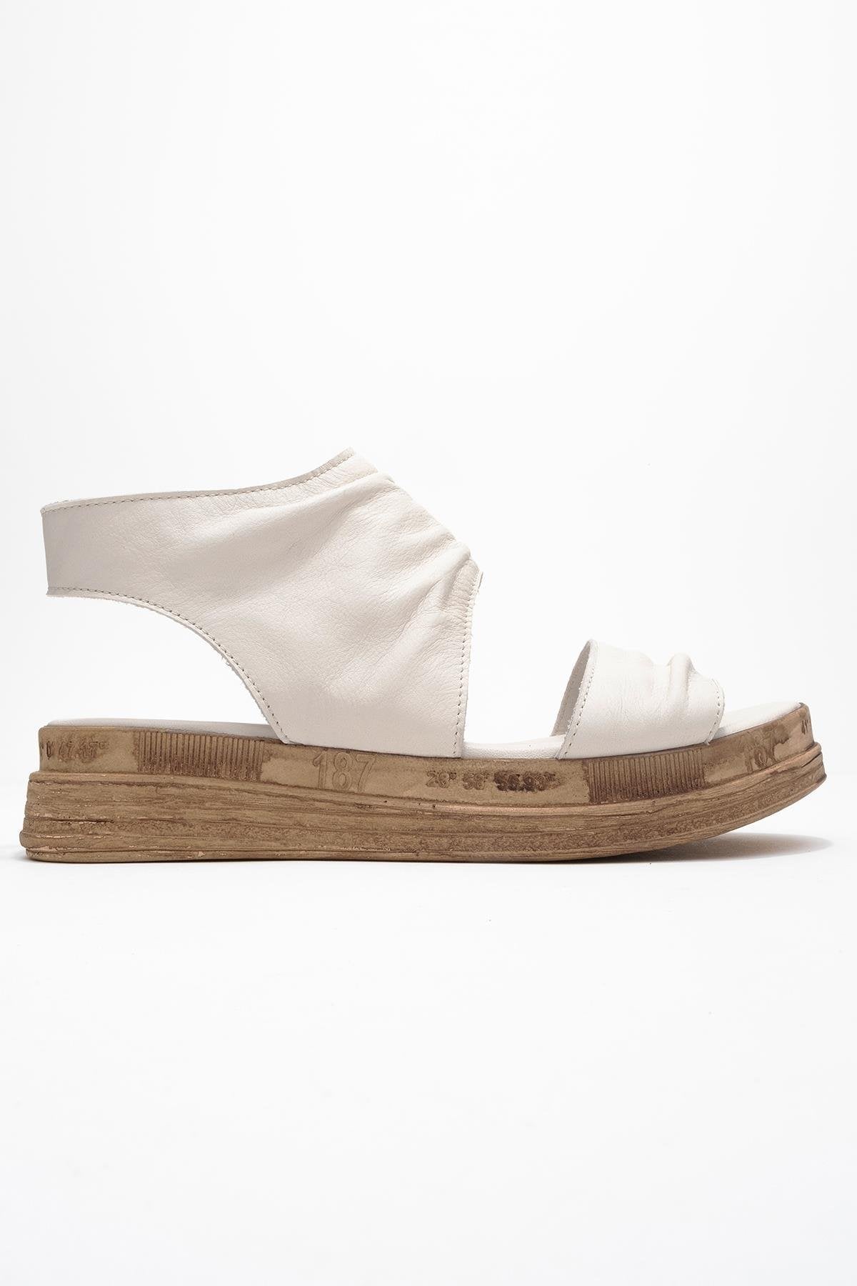 Lunas Cream Leather Side‑Zip Flat Heel Sandal – top view showing leather, red, Vowalisse
