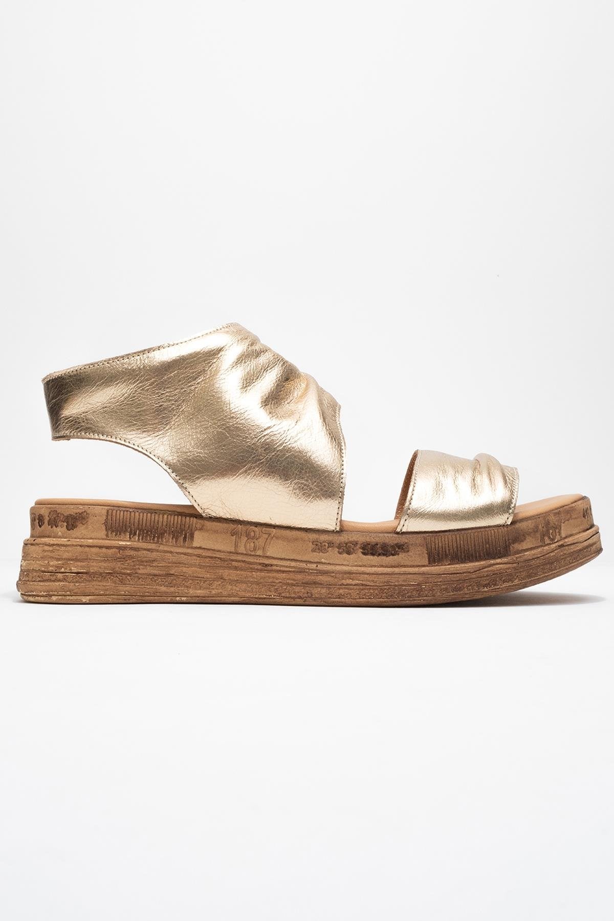 Lunas Gold Leather Side‑Zip Flat Heel Sandal – top view showing leather, gold, red, Vowalisse