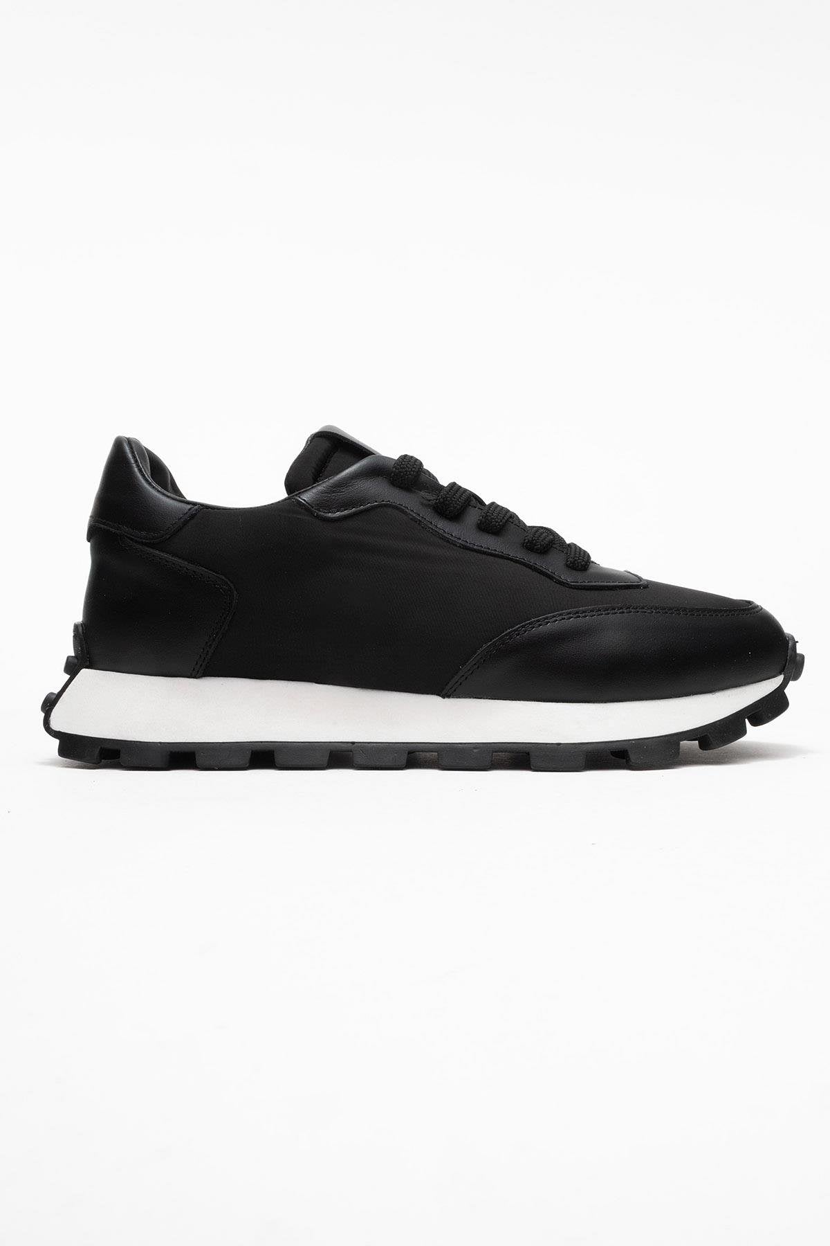 Amanda - Black Genuine Leather Sneaker – top view showing leather, black, Vowalisse