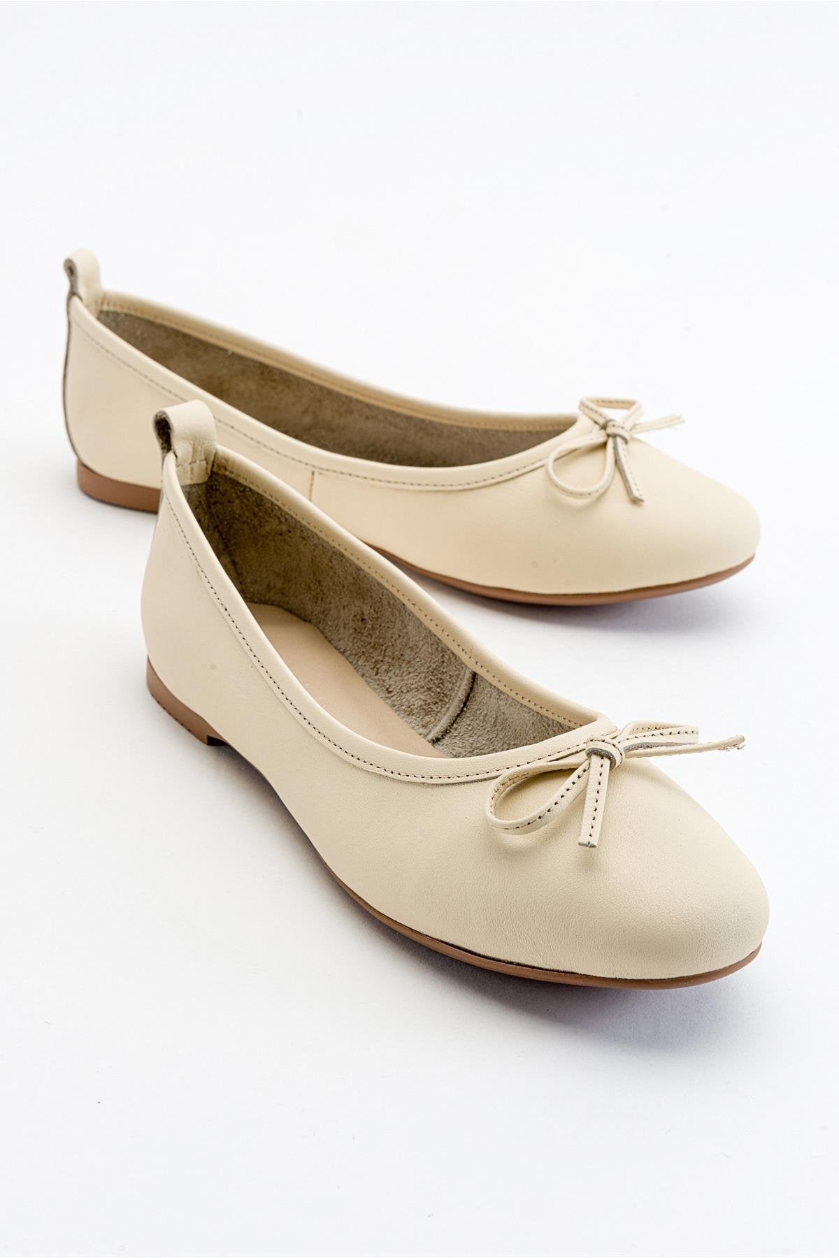 Florence - Beige Ballerina Flats – front three-quarter view showing bow, leather, suede, Vowalisse