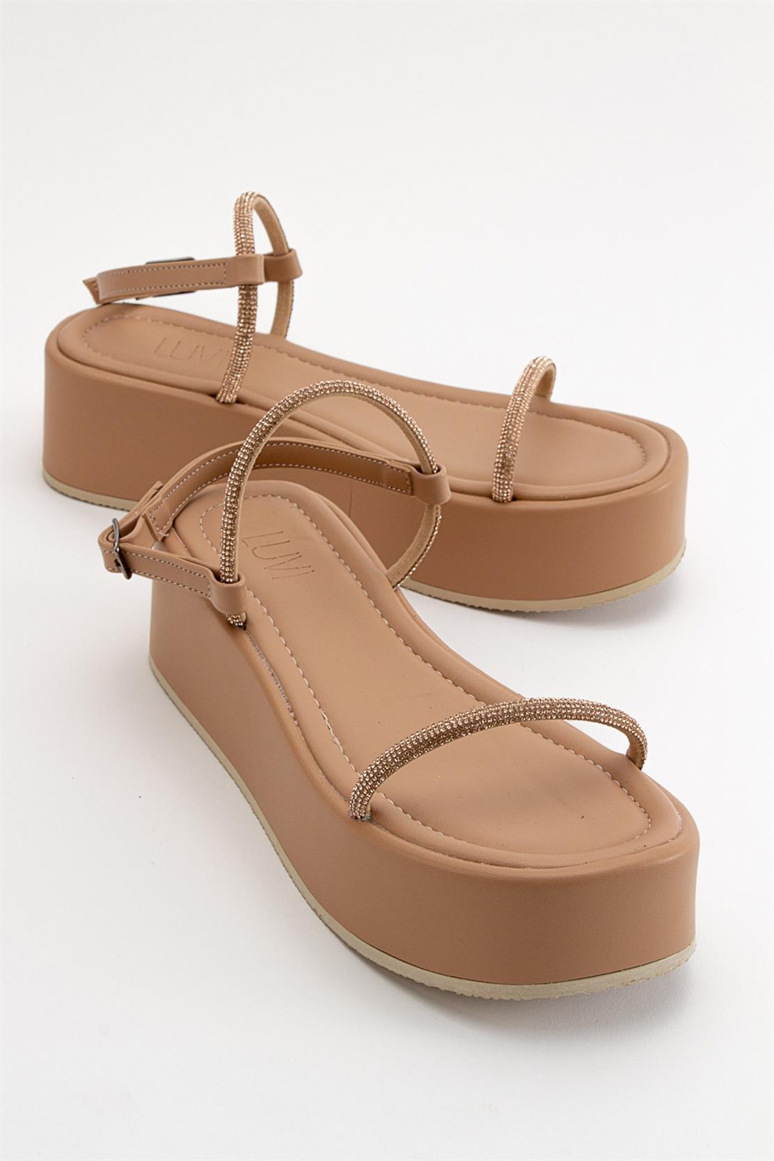 Ekos - Beige Jeweled Platform Sandal – front three-quarter view showing leather, Vowalisse
