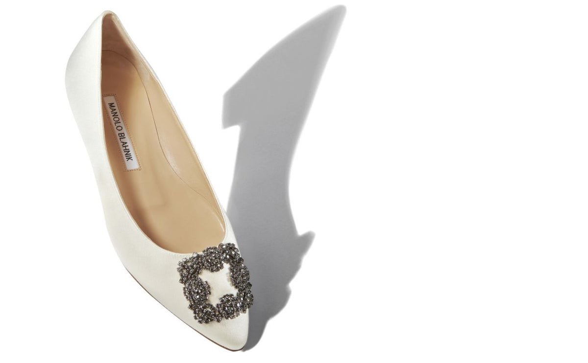 Clarisse Bloom White Jewel Buckle Pumps – front three-quarter view showing white jewel buckle, crystal buckle, almond toe…