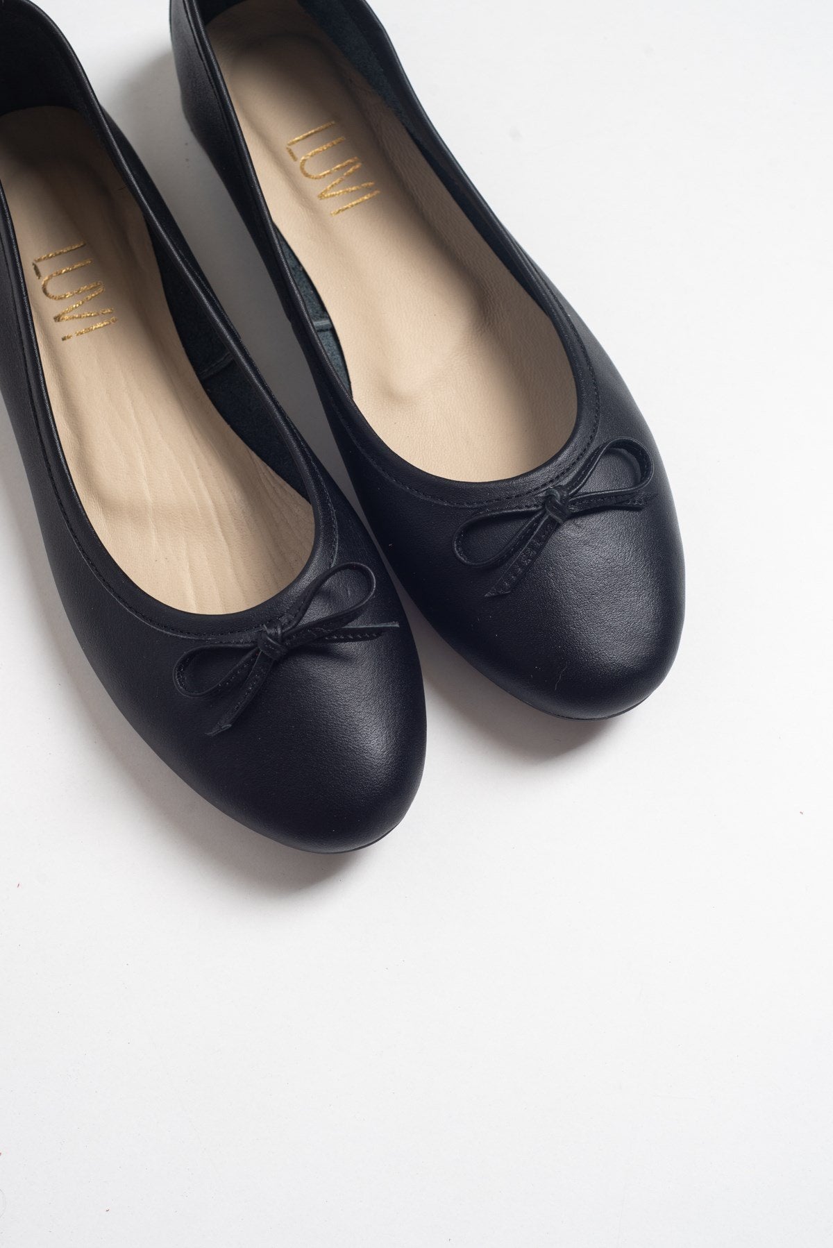 Florence - Black Ballerina Flats – side view showing bow, leather, suede, Vowalisse