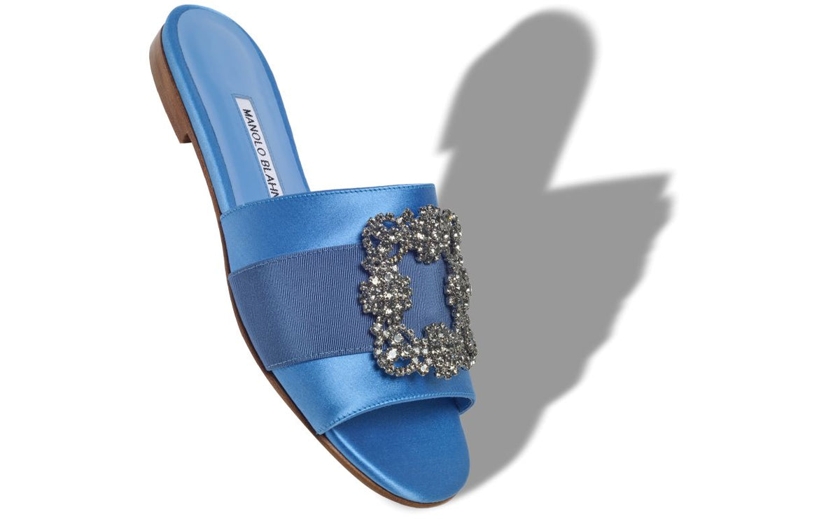 Marielle Pearl Blue Jewel Buckle Mules – front three-quarter view showing blue jewel buckle, crystal buckle, satin…