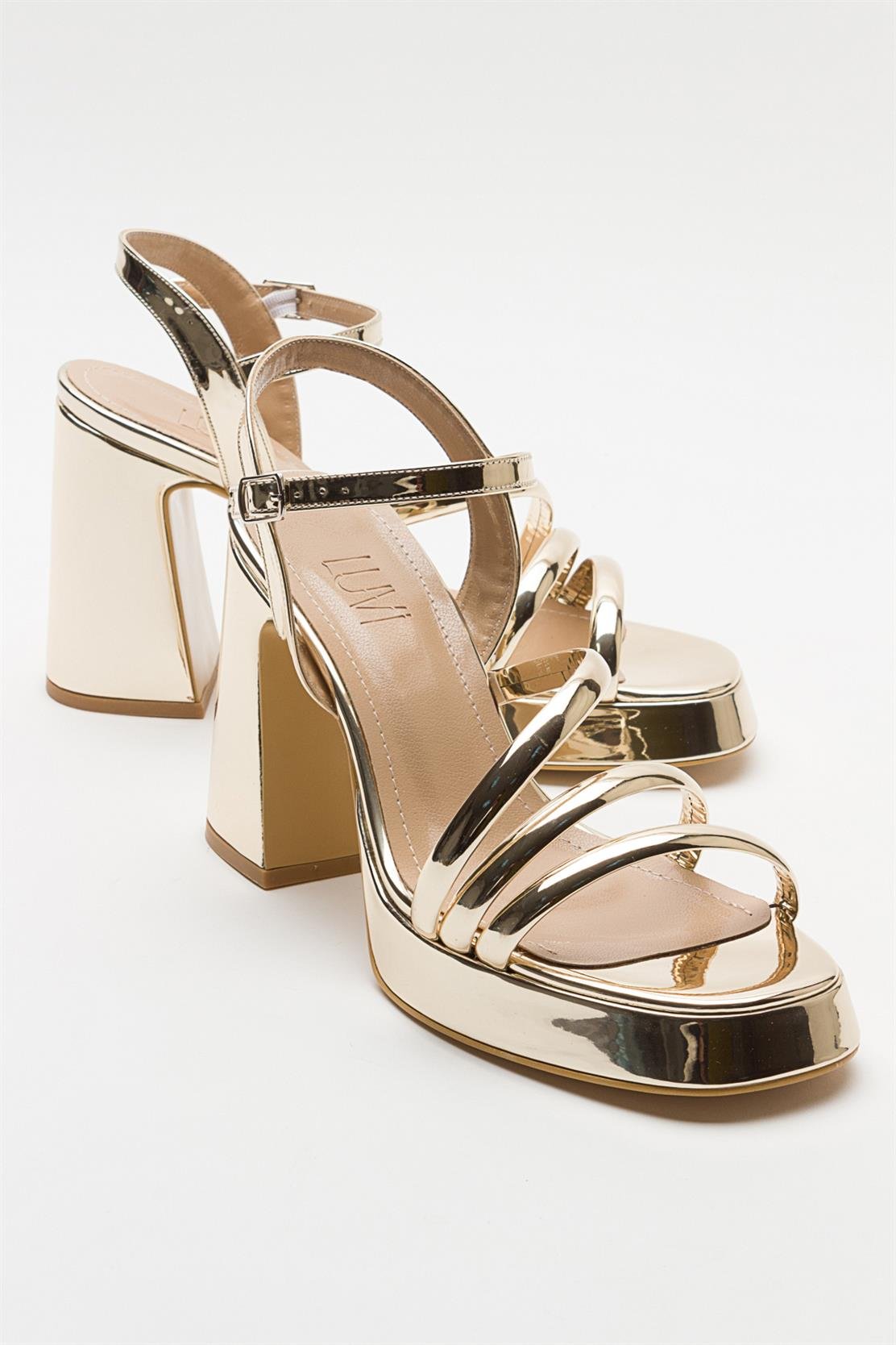 Heas Gold Platform Sandal – front three-quarter view showing leather, gold, Vowalisse