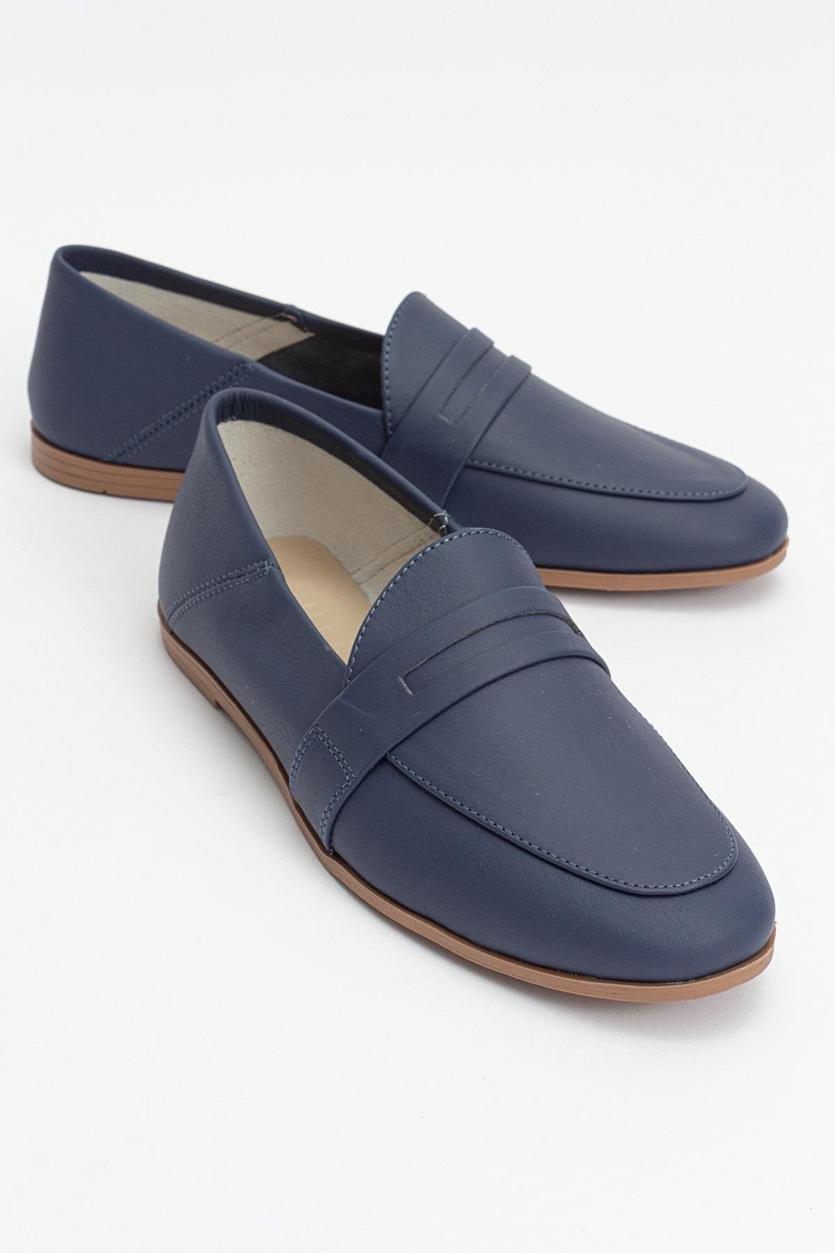 F05 - Navy Genuine Leather Loafer – front three-quarter view showing leather, Vowalisse