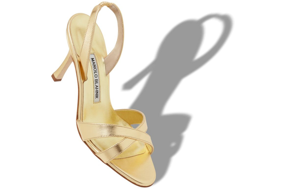 Alessia Dawn Gold Crossover Slingbacks – front three-quarter view showing gold crossover, slingback, open toe, nappa…