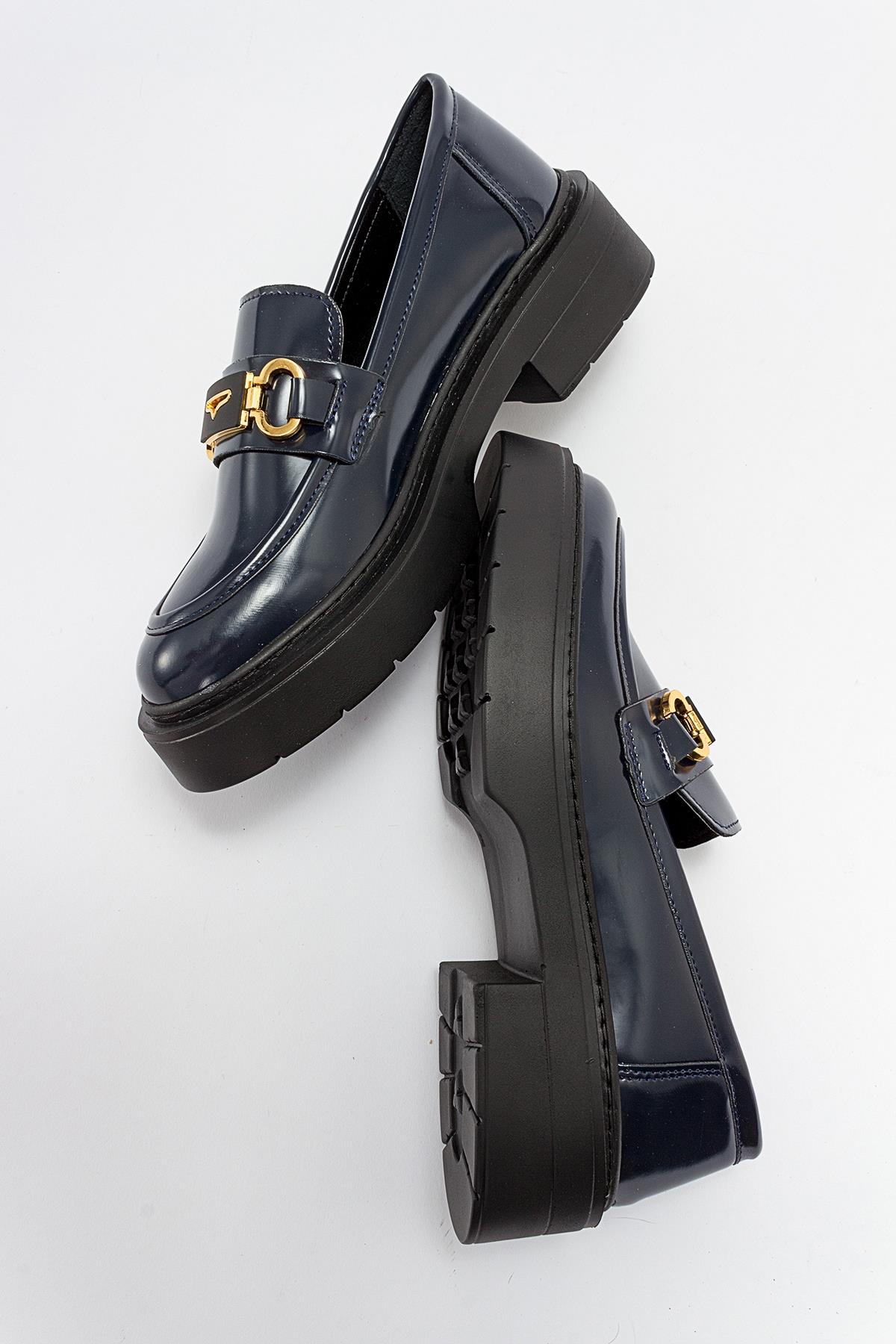 Simone - Navy Patent Bit Platform Loafers – detail view showing leather, suede, Vowalisse