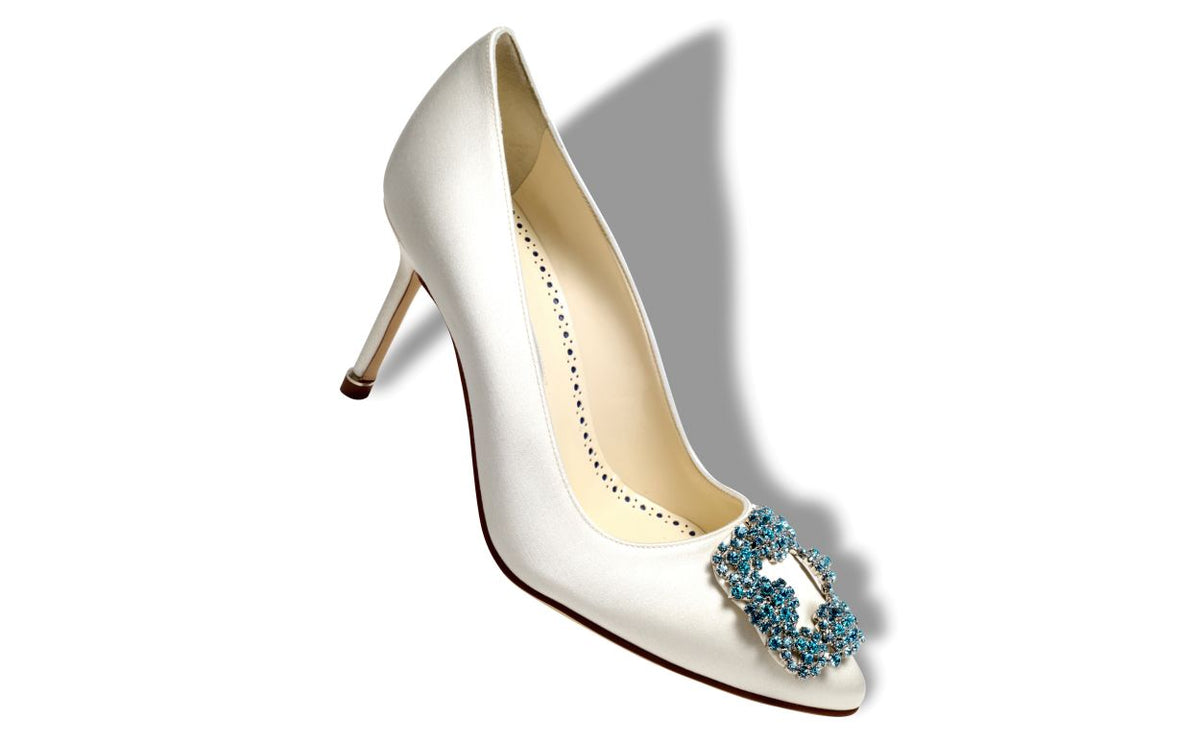 Magnolia Crown White Jewel Buckle Pumps – front three-quarter view showing white jewel buckle, crystal buckle, almond toe…