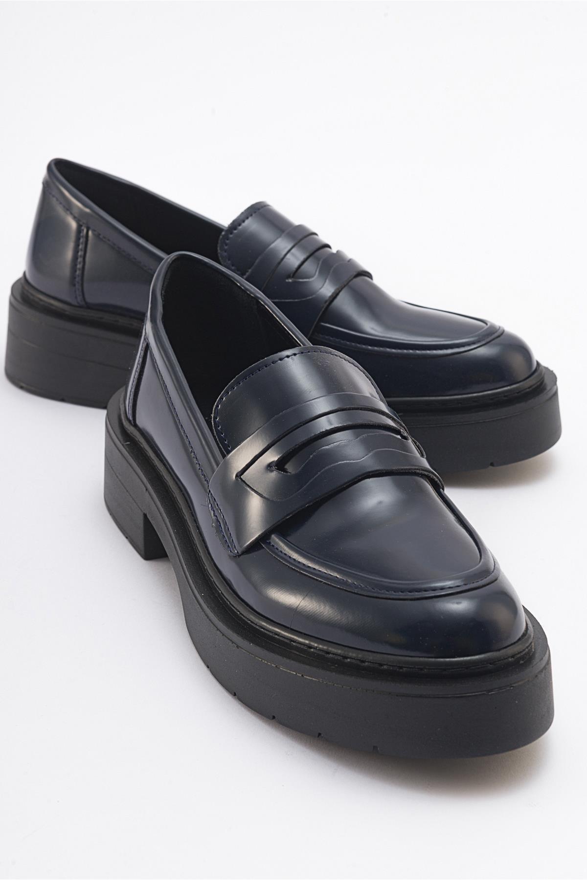 Nonte - Navy Suede Loafer – front three-quarter view showing leather, suede, Vowalisse