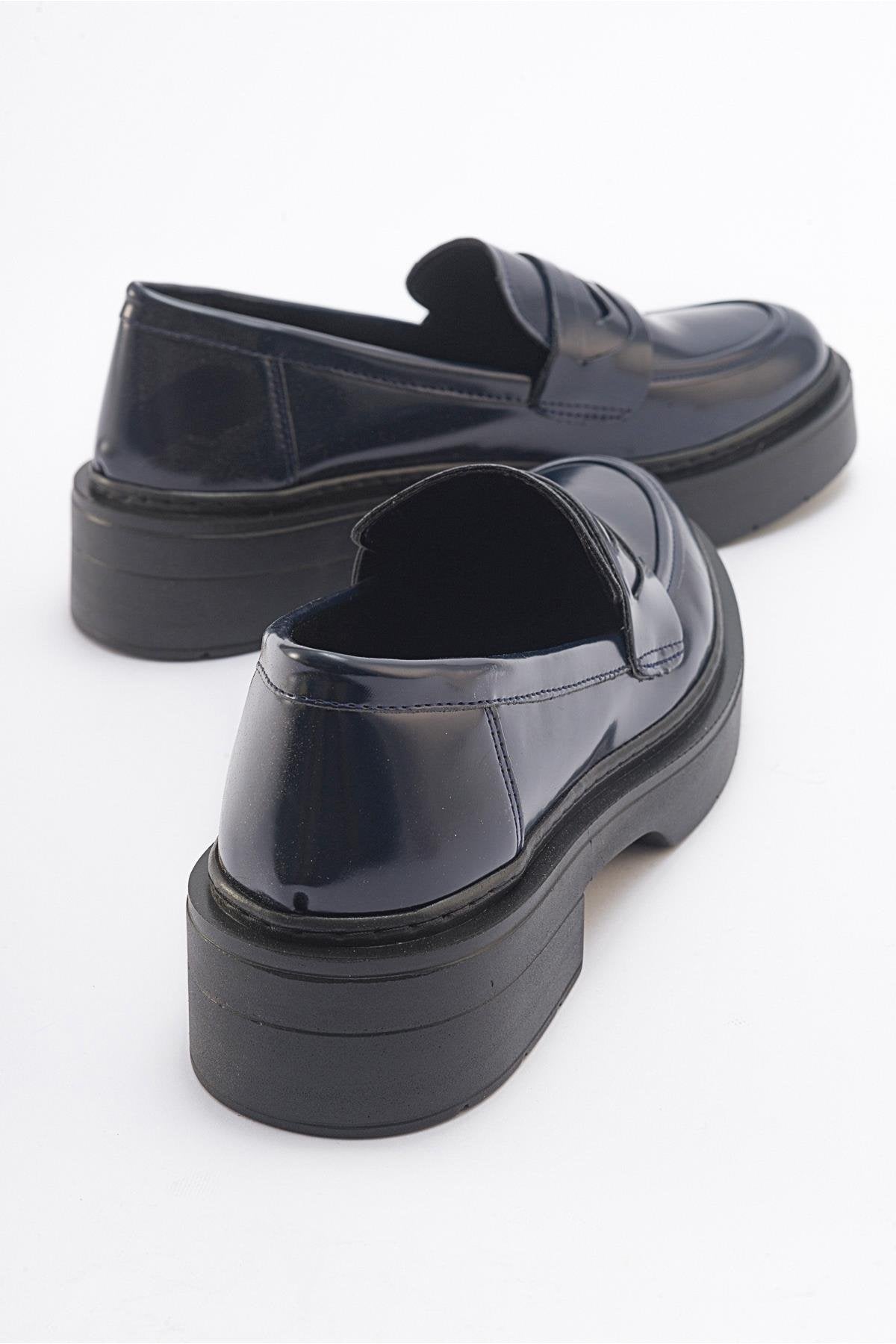 Nonte - Navy Suede Loafer – heel view showing leather, suede, Vowalisse