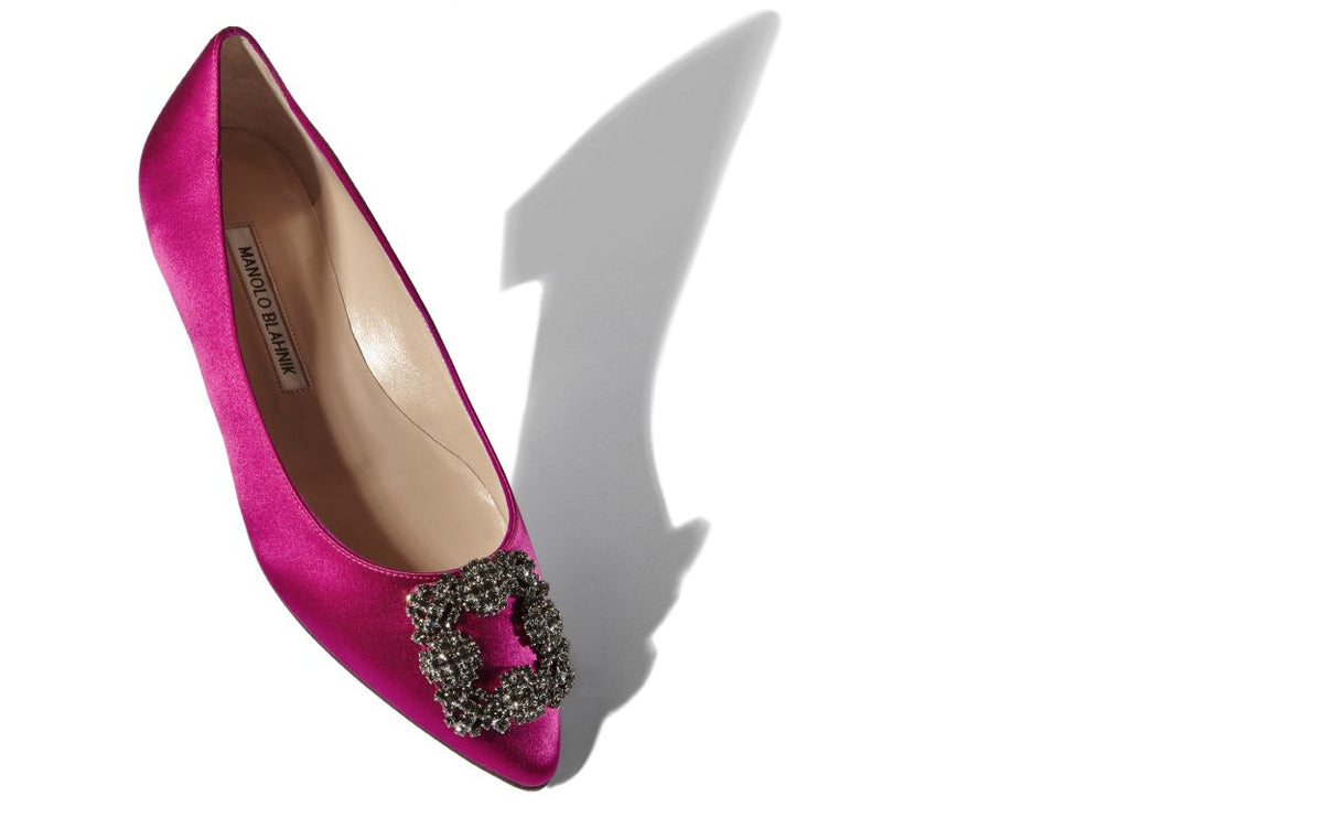 Estelle Crown Pink Jewel Buckle Pumps – front three-quarter view showing pink jewel buckle, crystal buckle, almond toe…