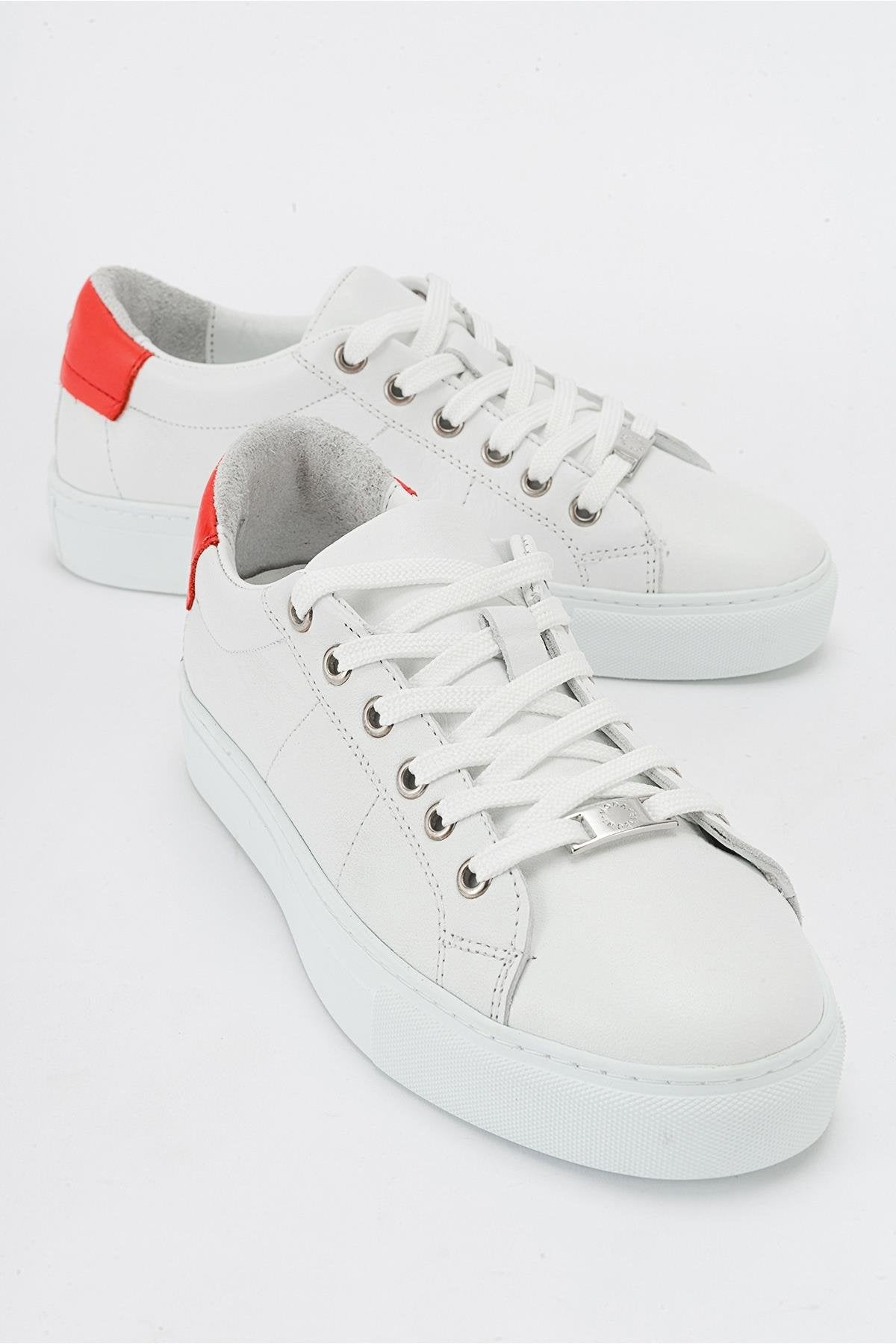 Ayverie - White Leather Sneaker – front three-quarter view showing leather, white, Vowalisse