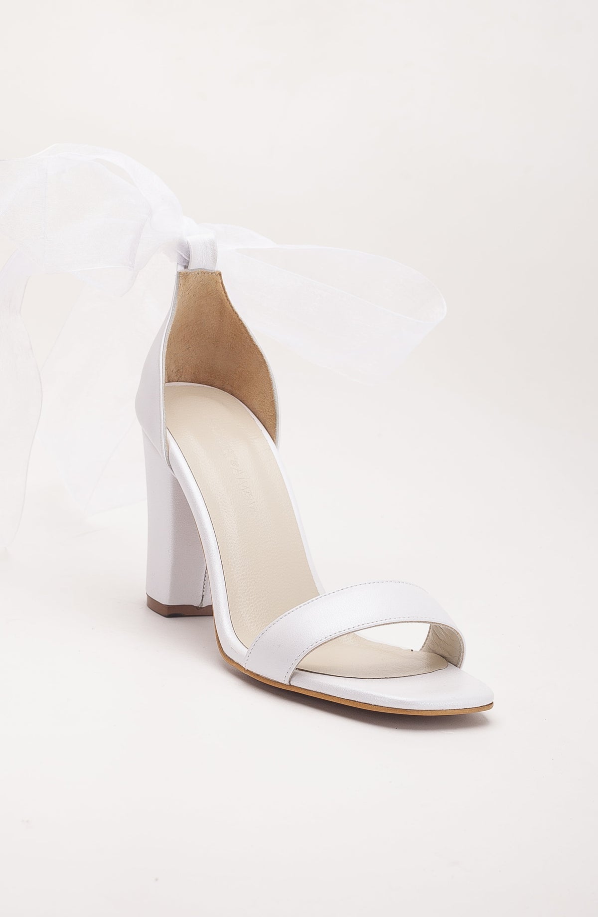 Taylor - Ivory Leather Wedding Sandals with Ribbon – front three-quarter view showing leather, ivory, Vowalisse