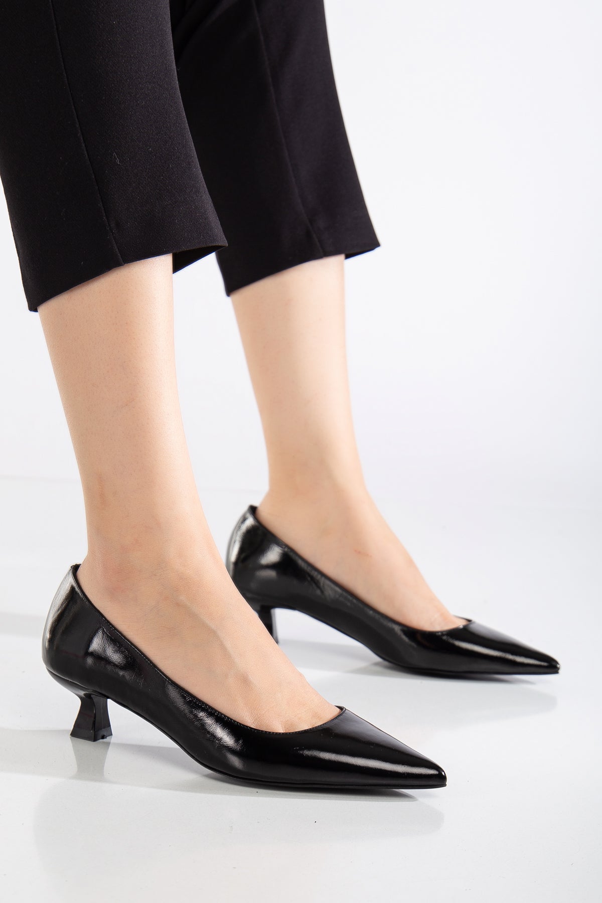 Helly - Black Patent Leather Stiletto Pumps – detail view showing leather, black, red, Vowalisse