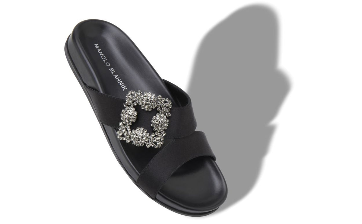 Marielle Grace Black Jewel Buckle Mules – front three-quarter view showing black jewel buckle, crossover, open toe, satin…