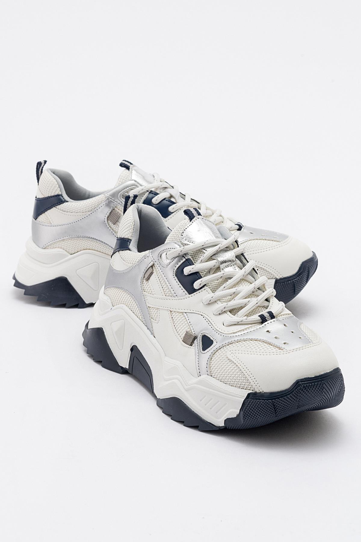 Loretta - White-Navy Sneaker – front three-quarter view showing leather, white, Vowalisse