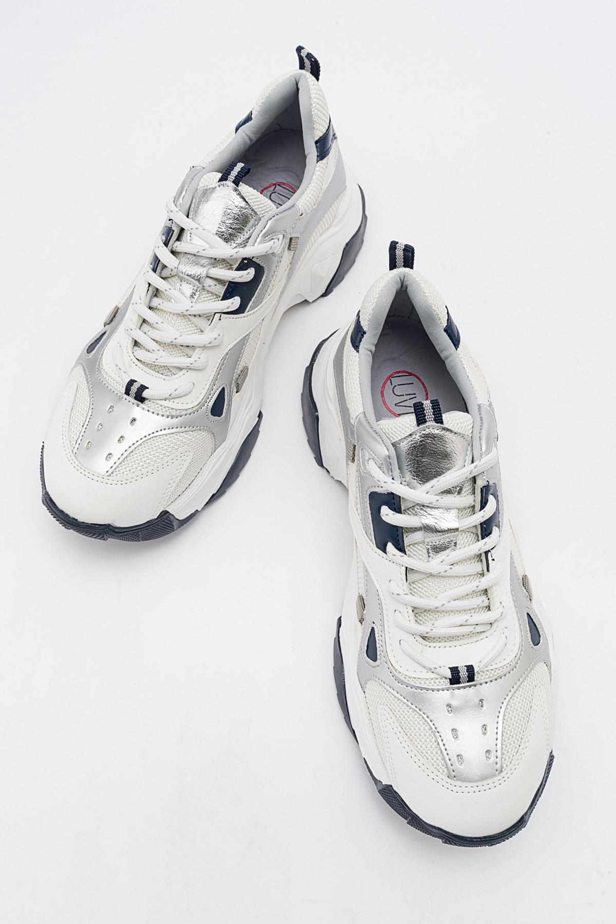 Loretta - White-Navy Sneaker – side view showing leather, white, Vowalisse