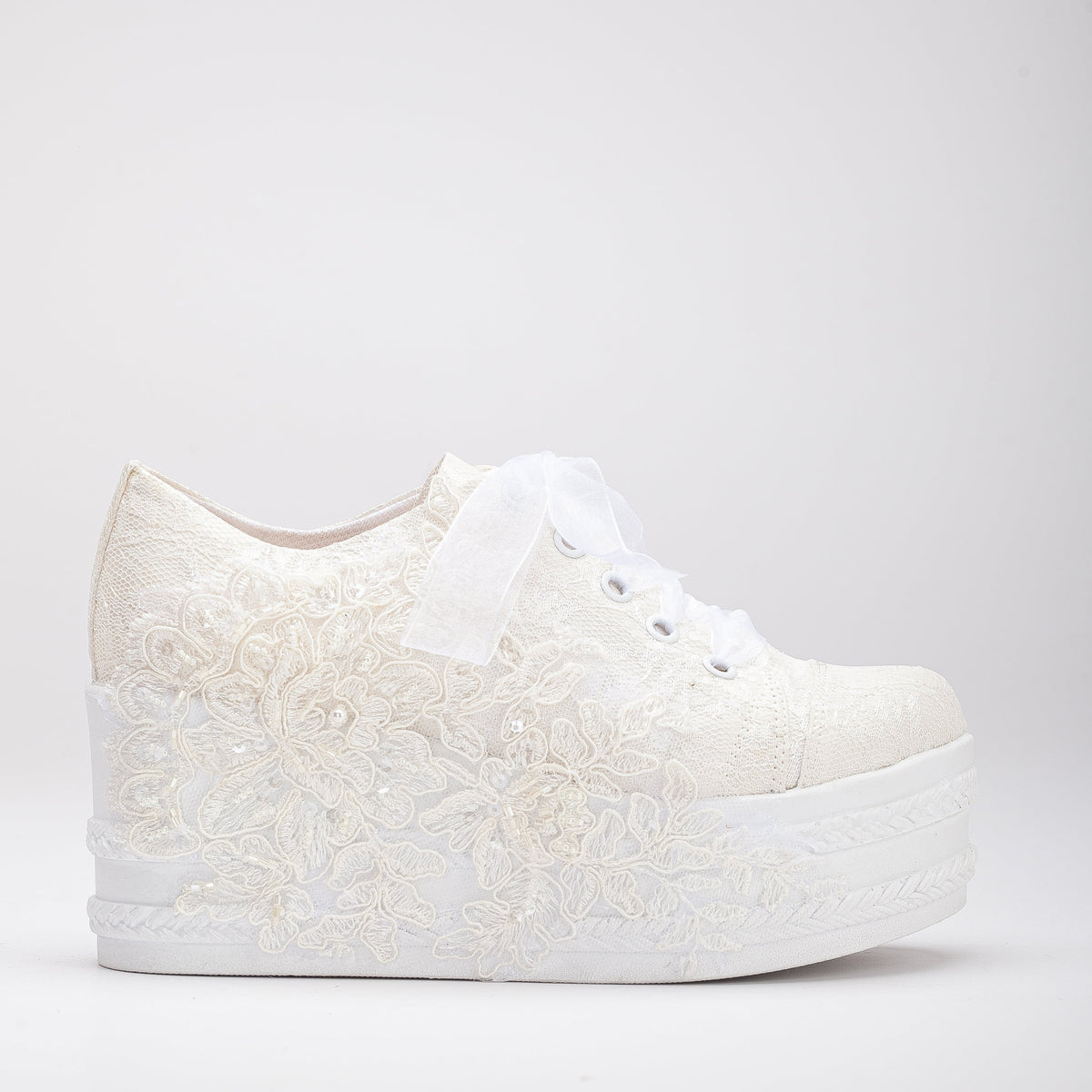 Claudine - Ivory Lace Wedding Sneakers – front three-quarter view showing lace, ivory, red, Vowalisse